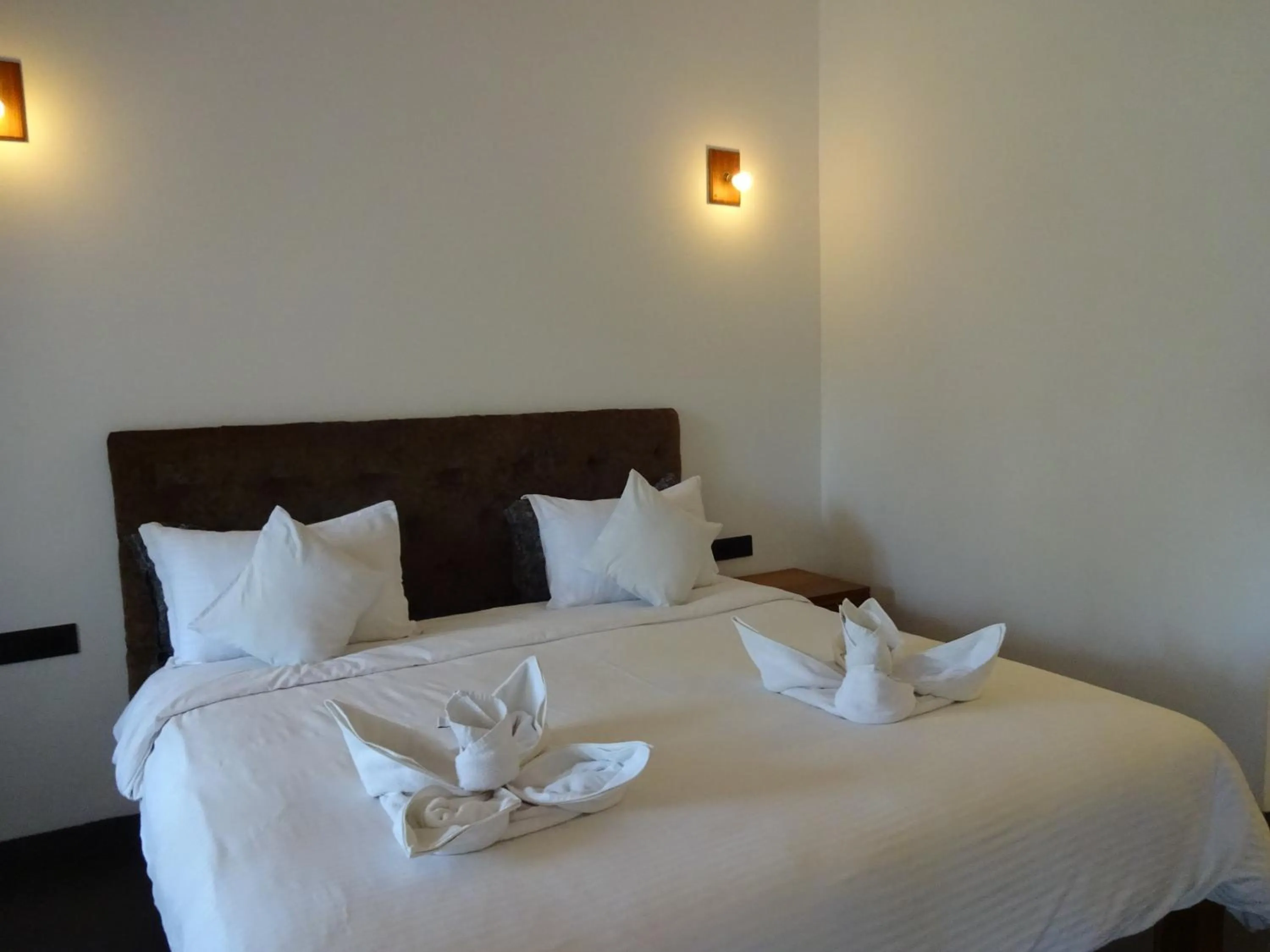 Bed in Dunhill Beach Resort