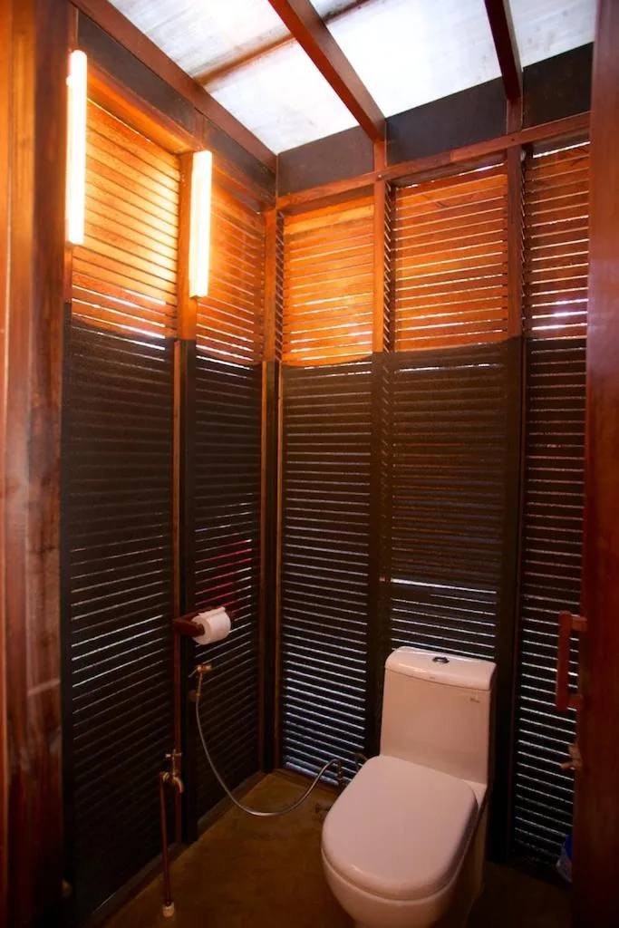 Toilet in Dunhill Beach Resort