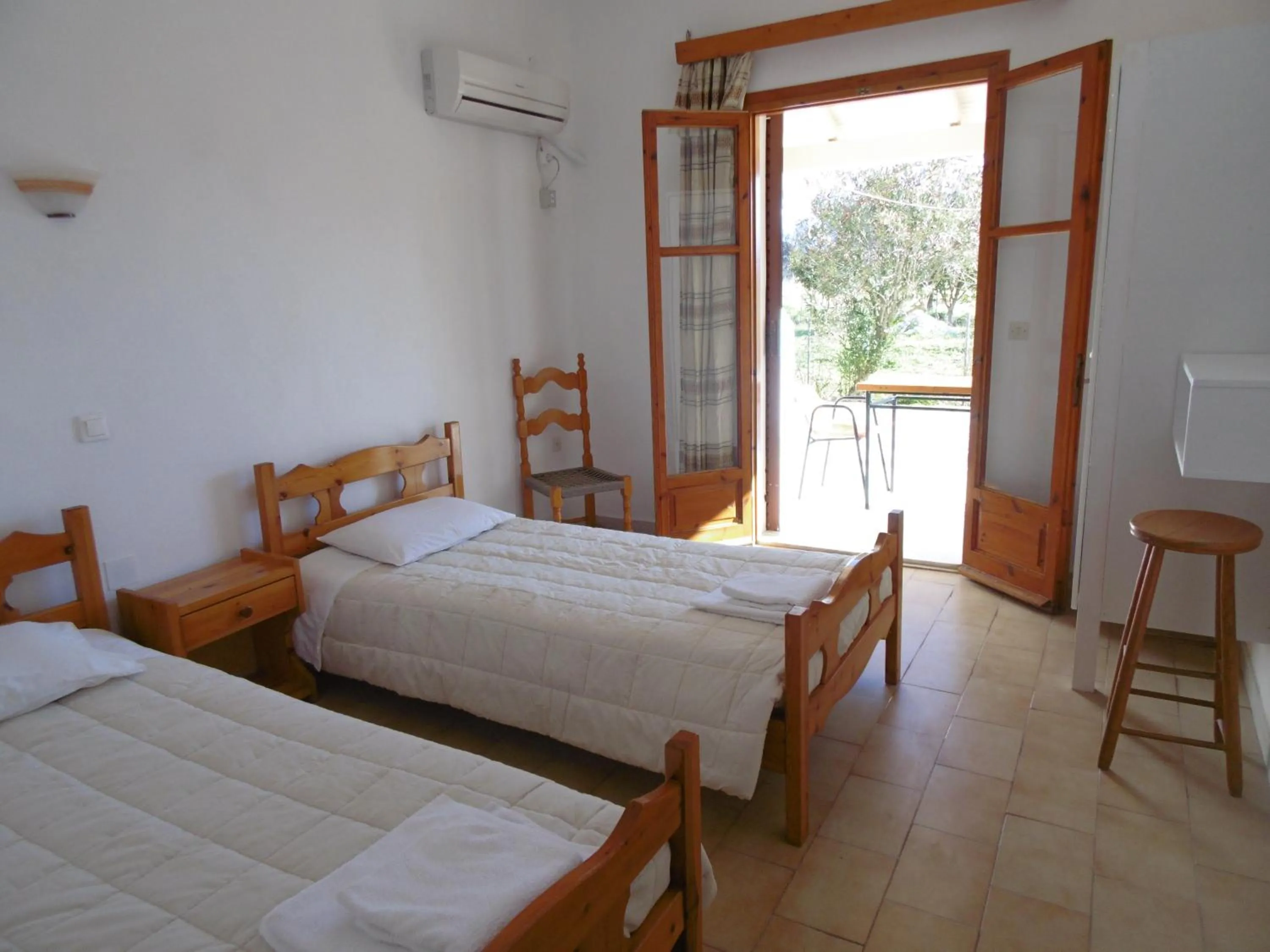 Bed in Apartments Elli - Nikos