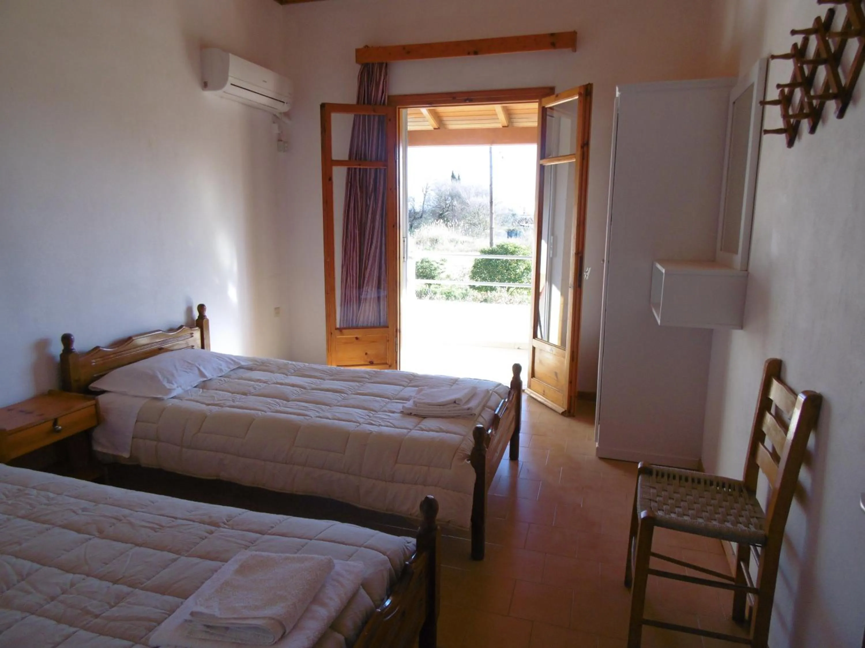 Bed in Apartments Elli - Nikos