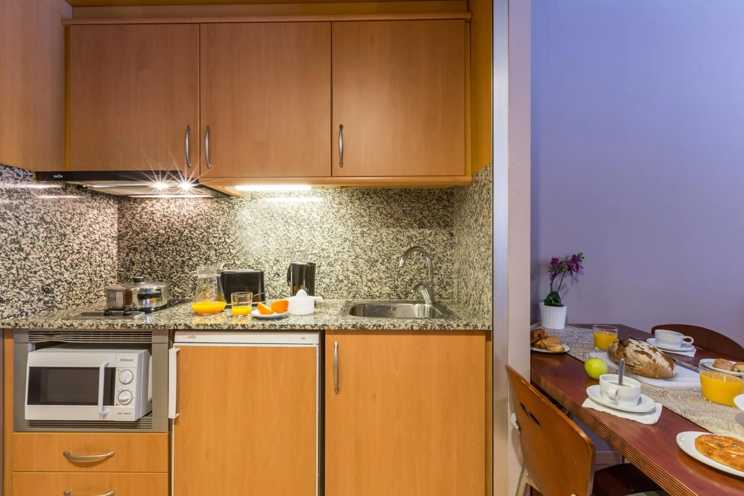 Kitchen or kitchenette in Pierre & Vacances Pas de la Casa Alaska