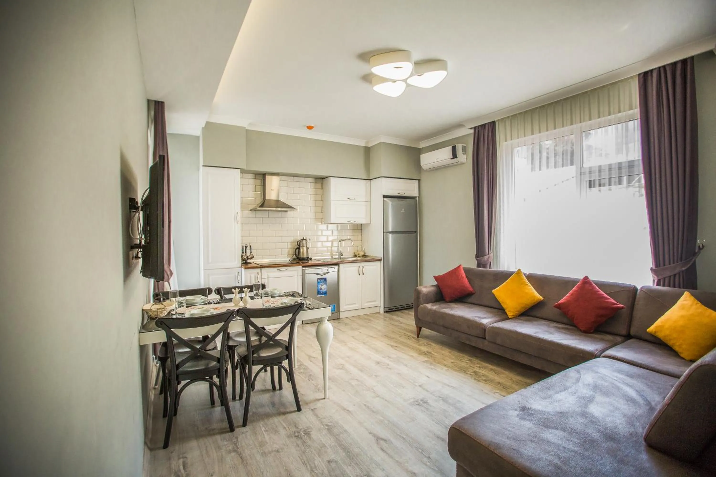 Kitchen or kitchenette in Doa Suite Hotel