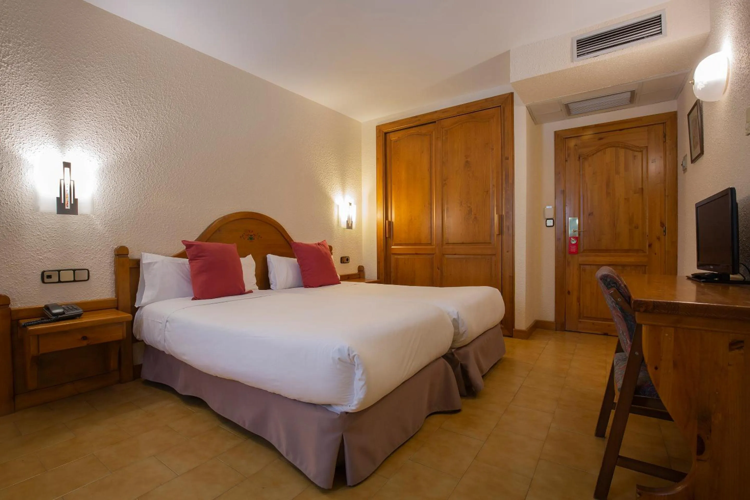 Bed in Hotel Sant Gothard by Nexta