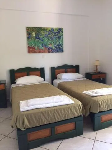 Photo of the whole room, Bed in Koukounaries Studios