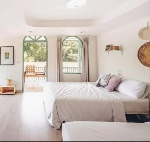 Bed in Baanpufa Resort