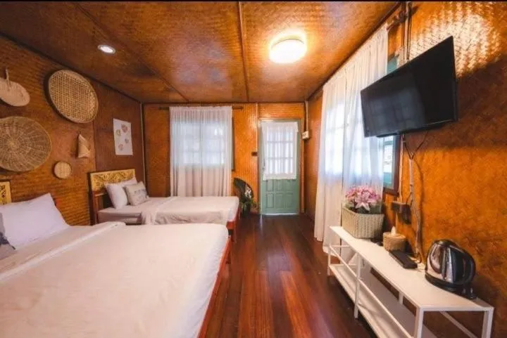 Bed in Baanpufa Resort