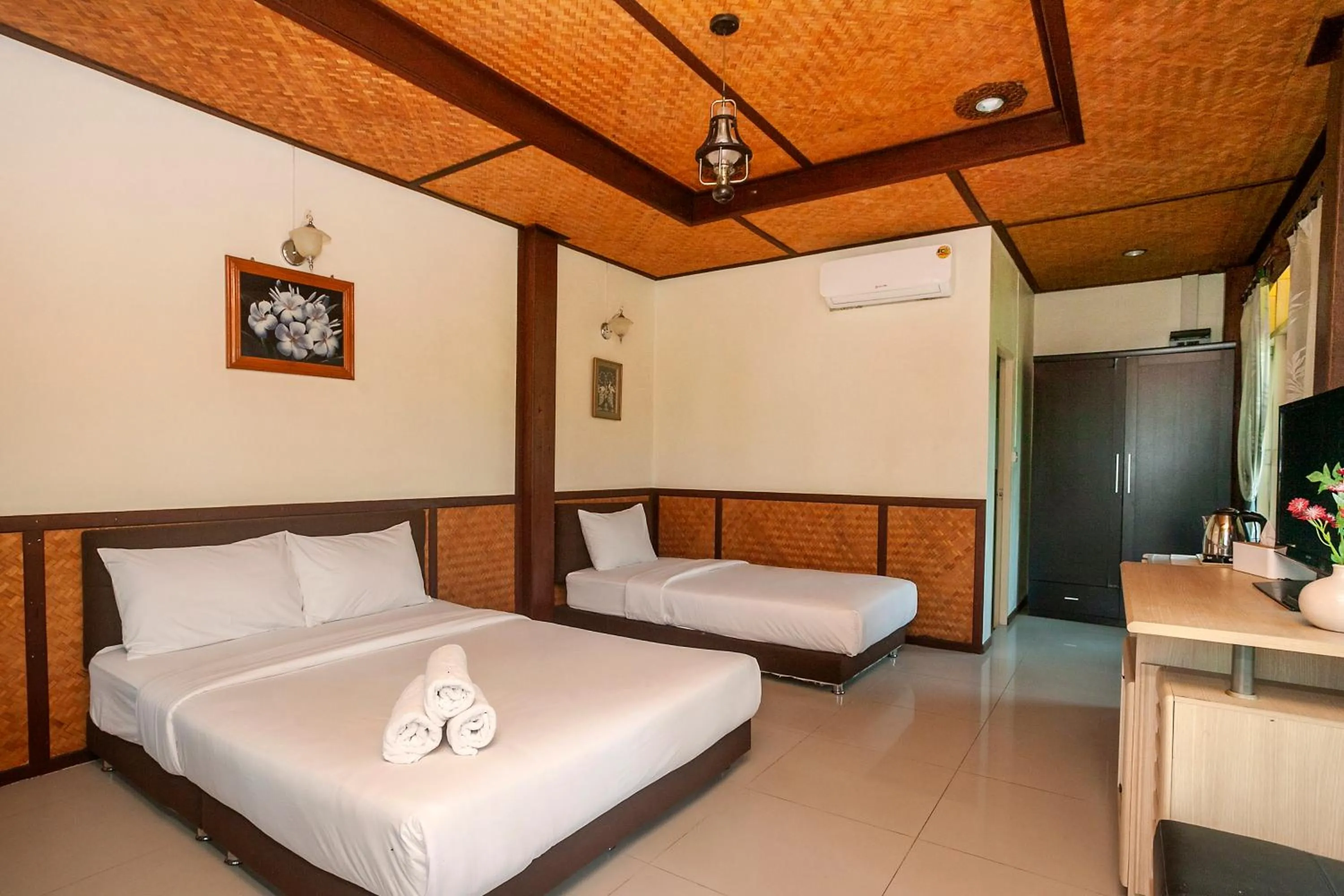 Bed in Baanpufa Resort