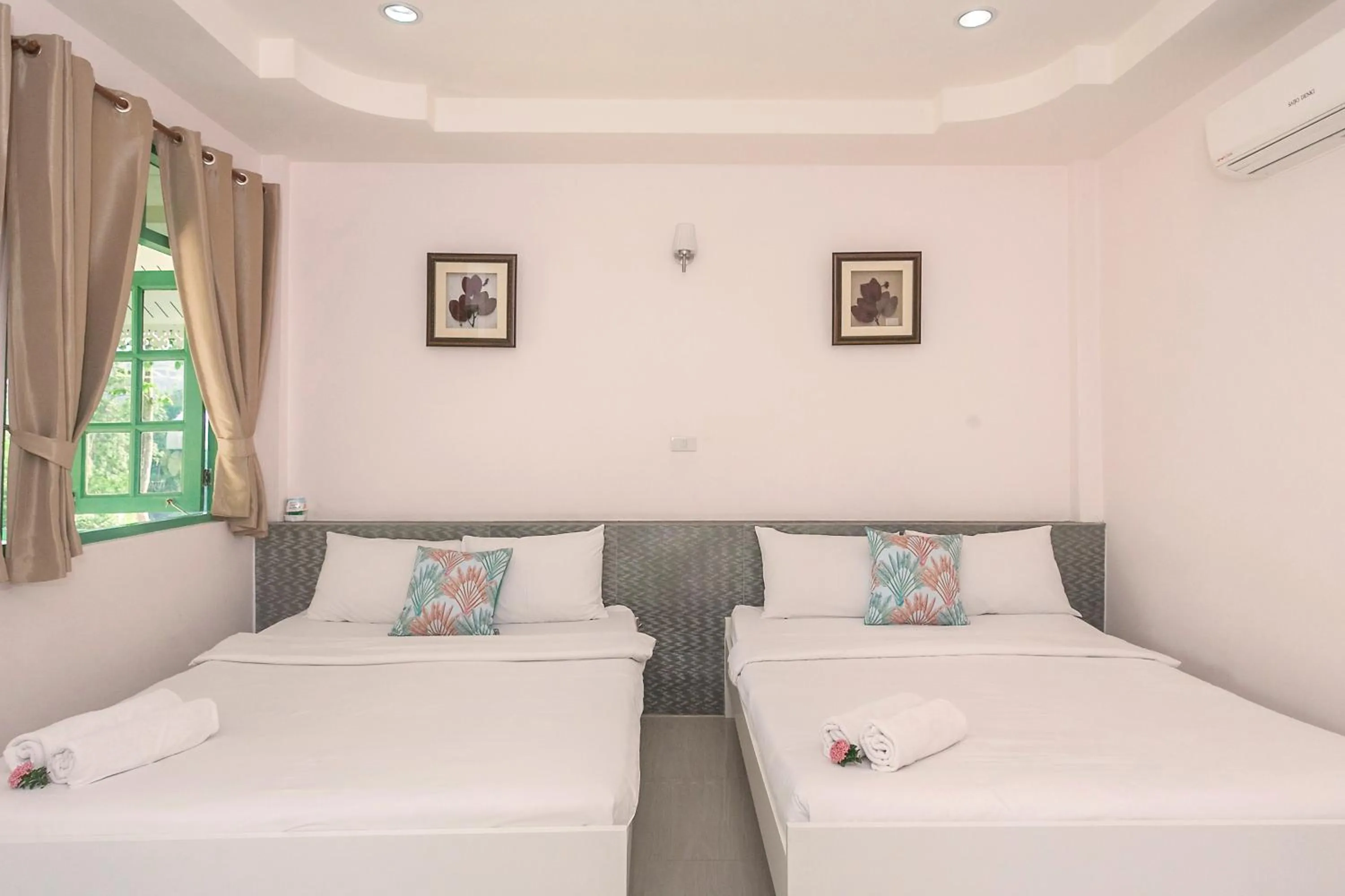 Bed in Baanpufa Resort