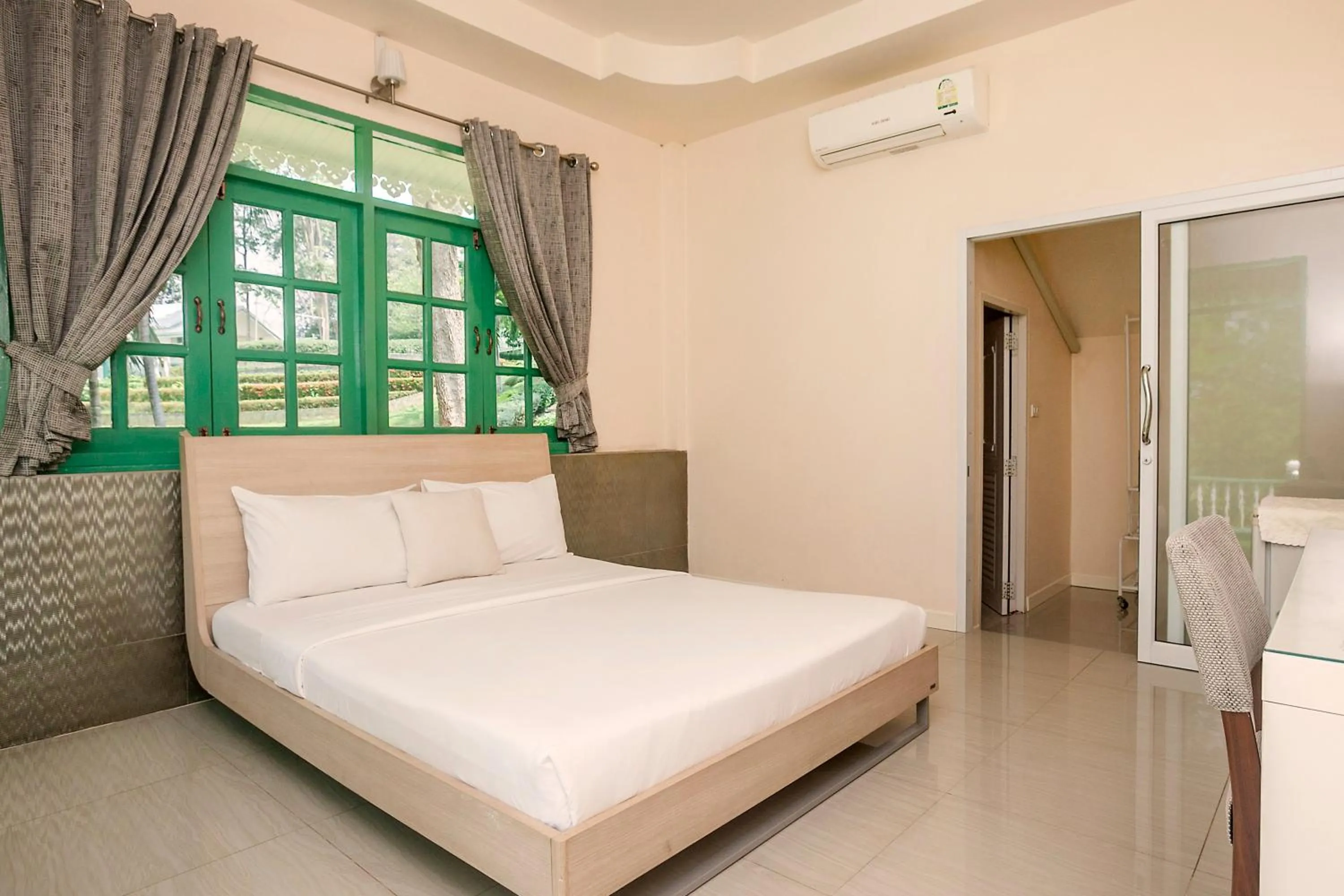 Bed in Baanpufa Resort