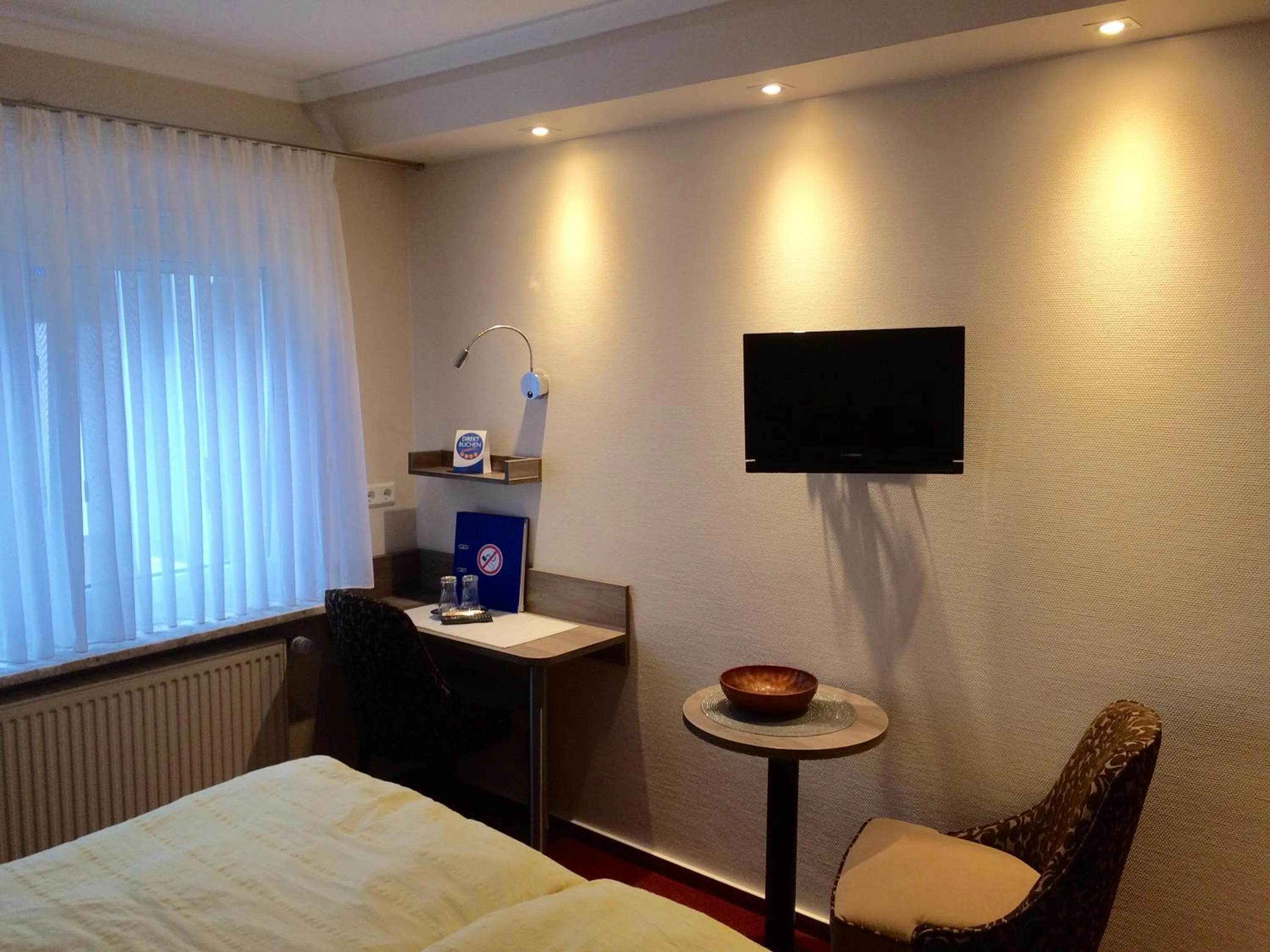 Photo of the whole room, Bed in Gästehaus Janßen