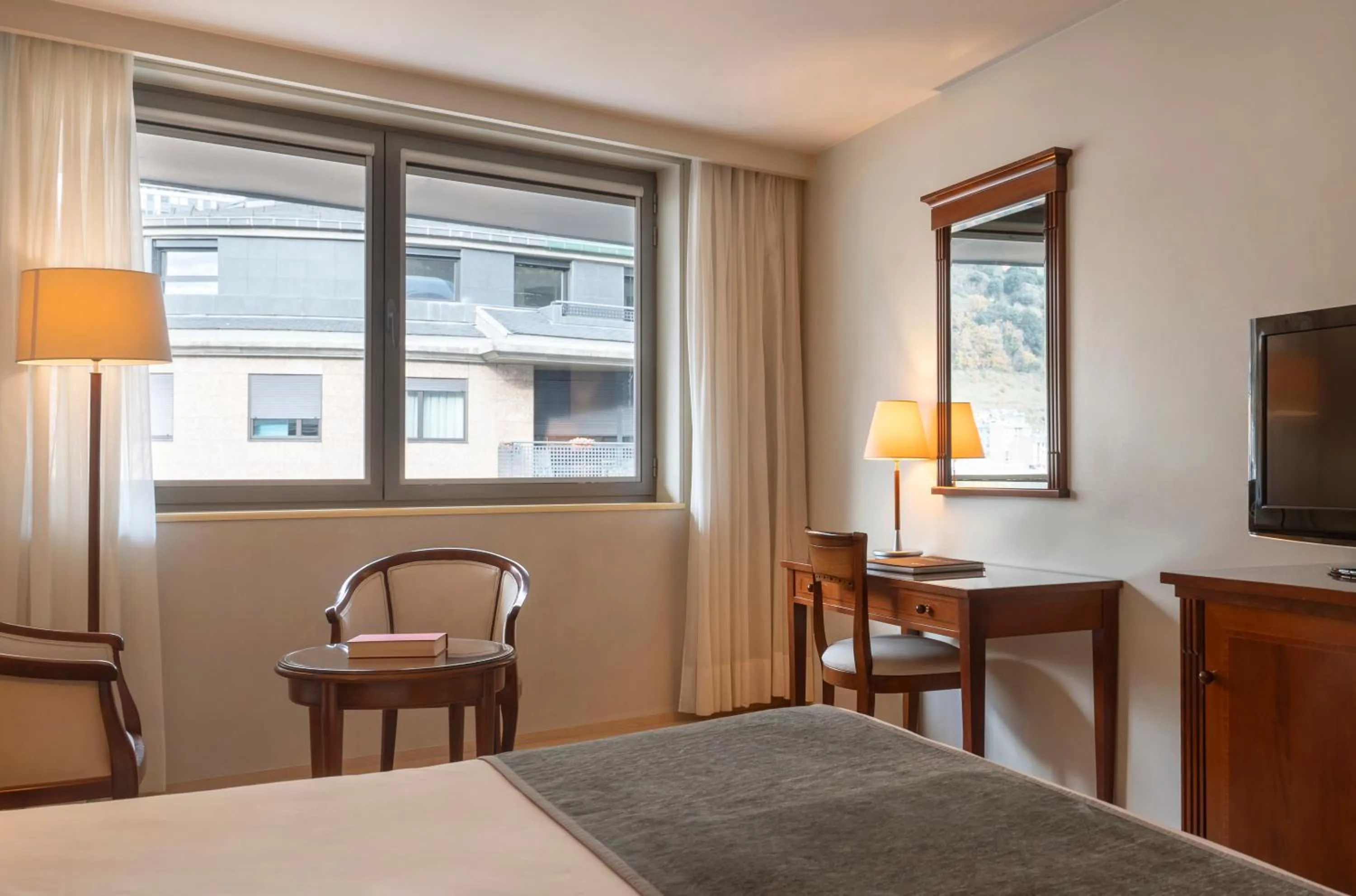 Seating area, Bed in Hesperia Andorra