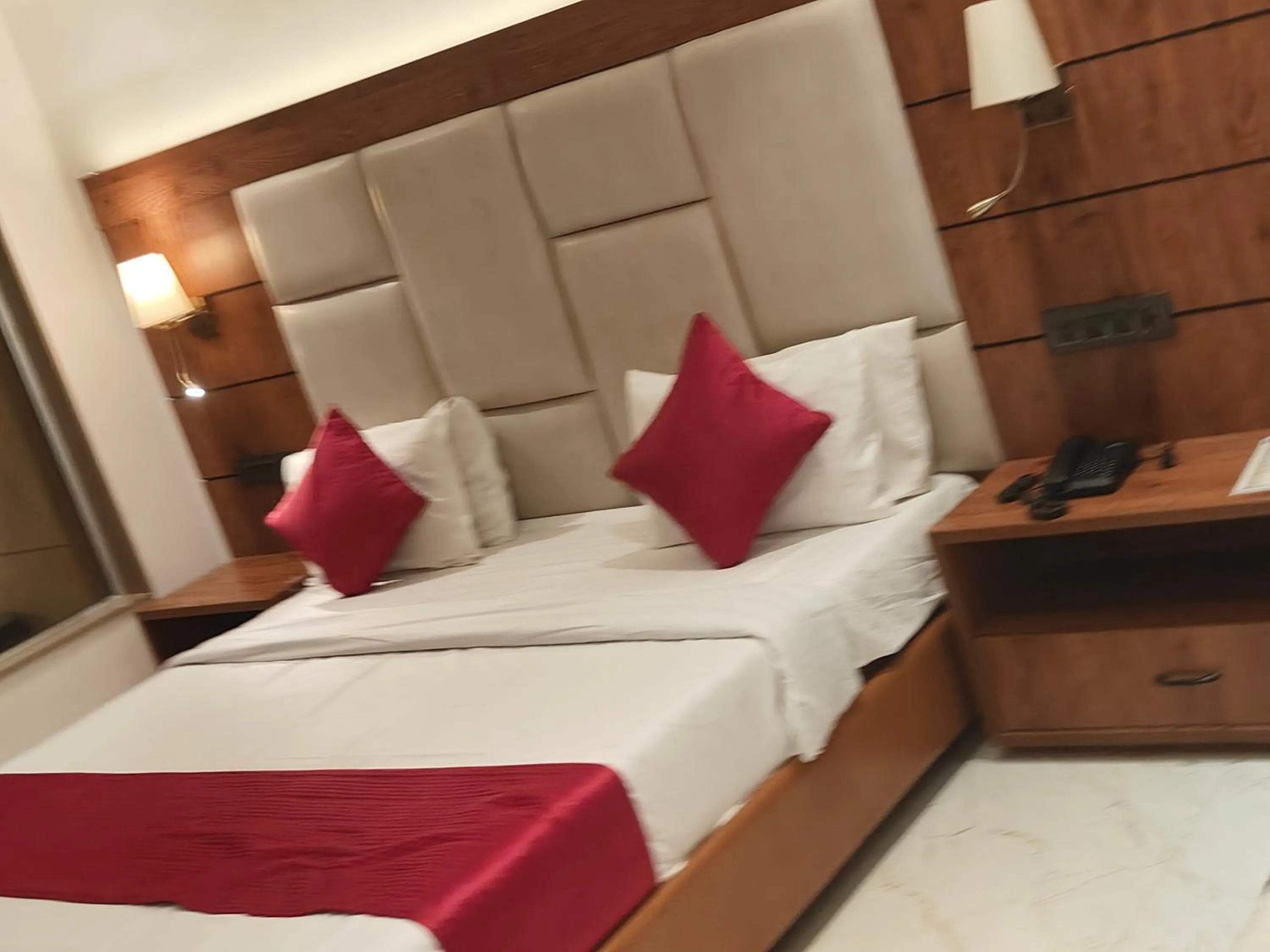 Bed in Hotel Anand Palace