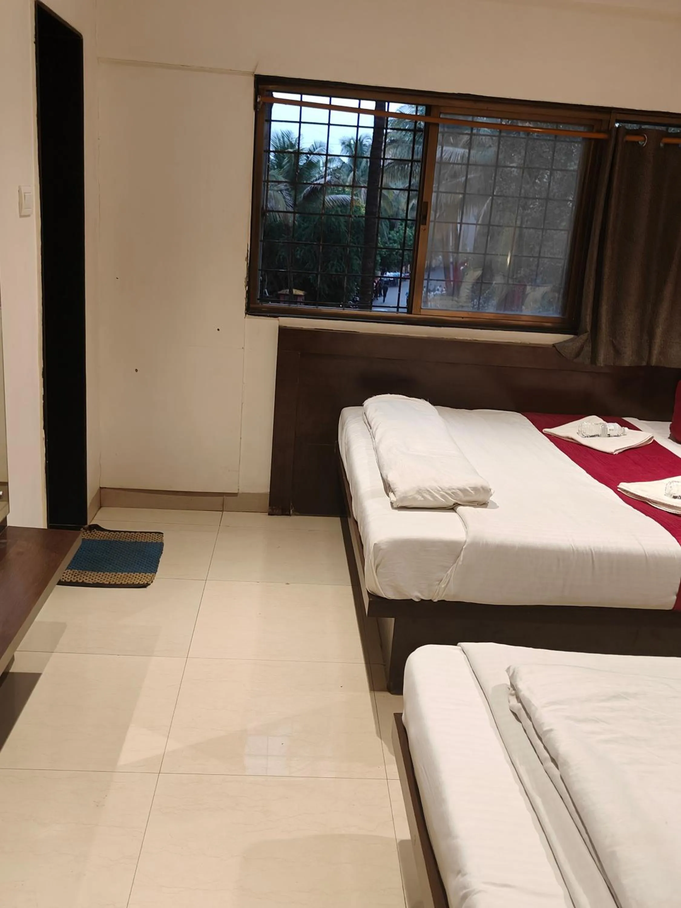 View (from property/room), Bed in Hotel Anand Palace