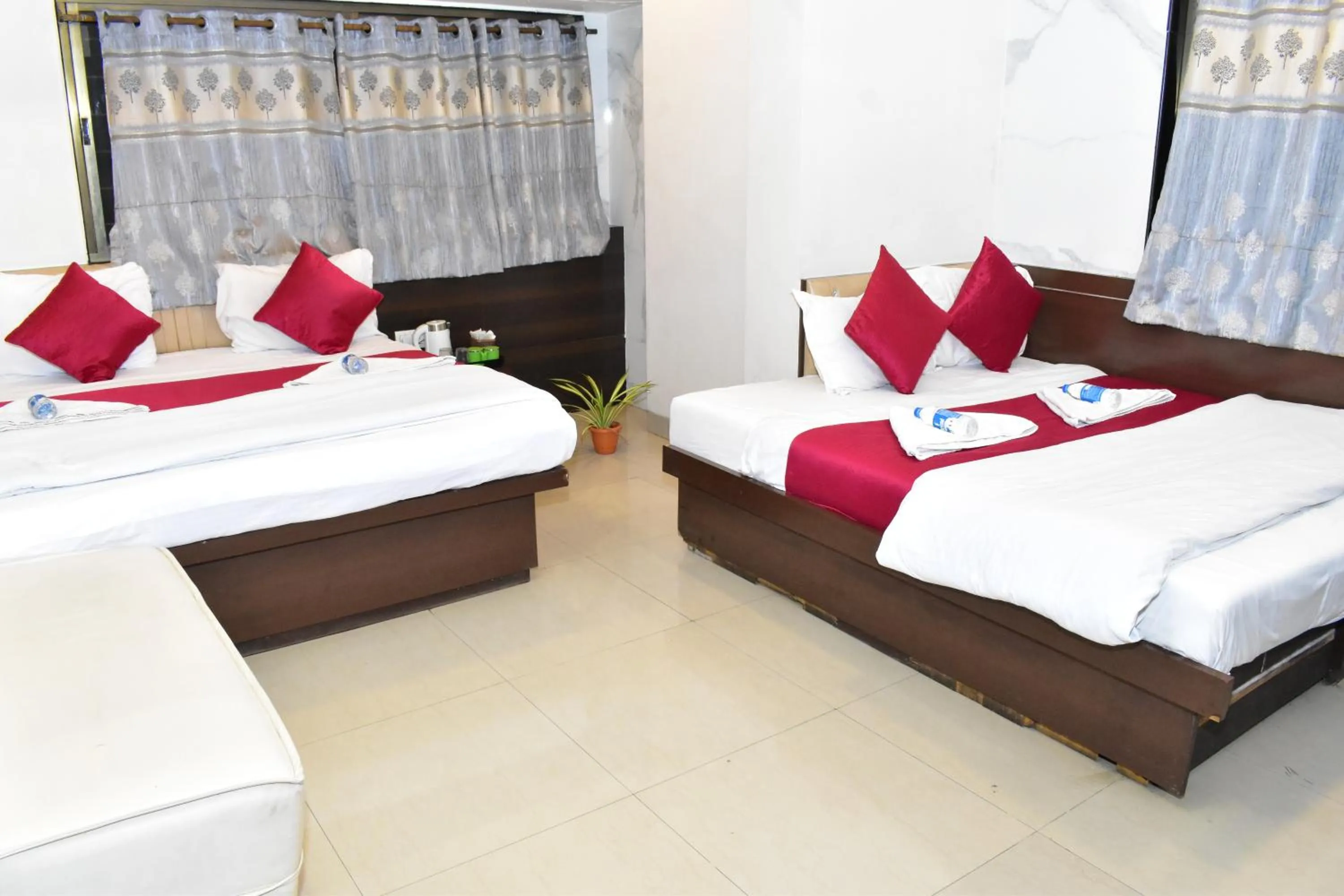 Bed in Hotel Anand Palace