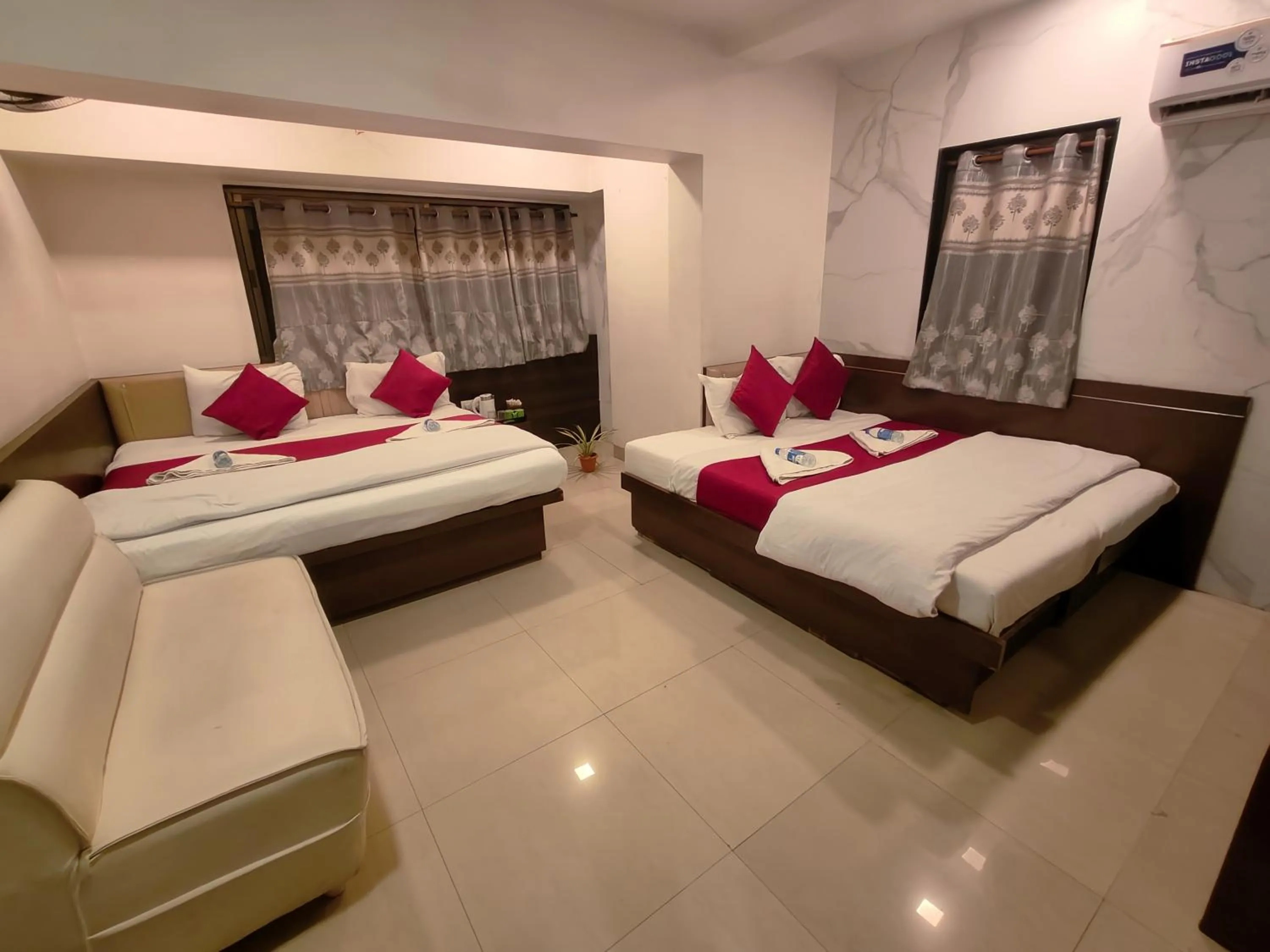 Bed in Hotel Anand Palace