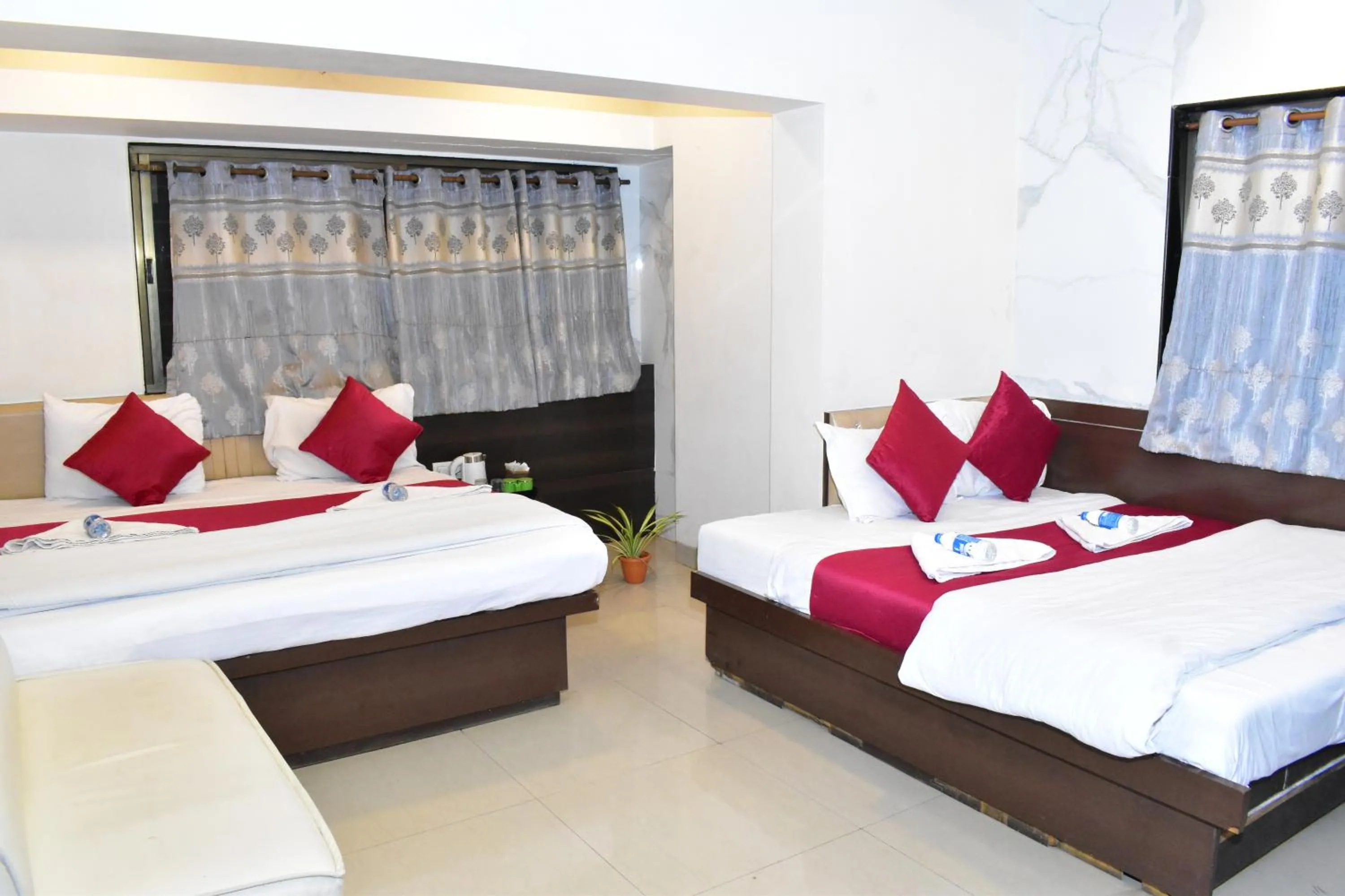 Bed in Hotel Anand Palace