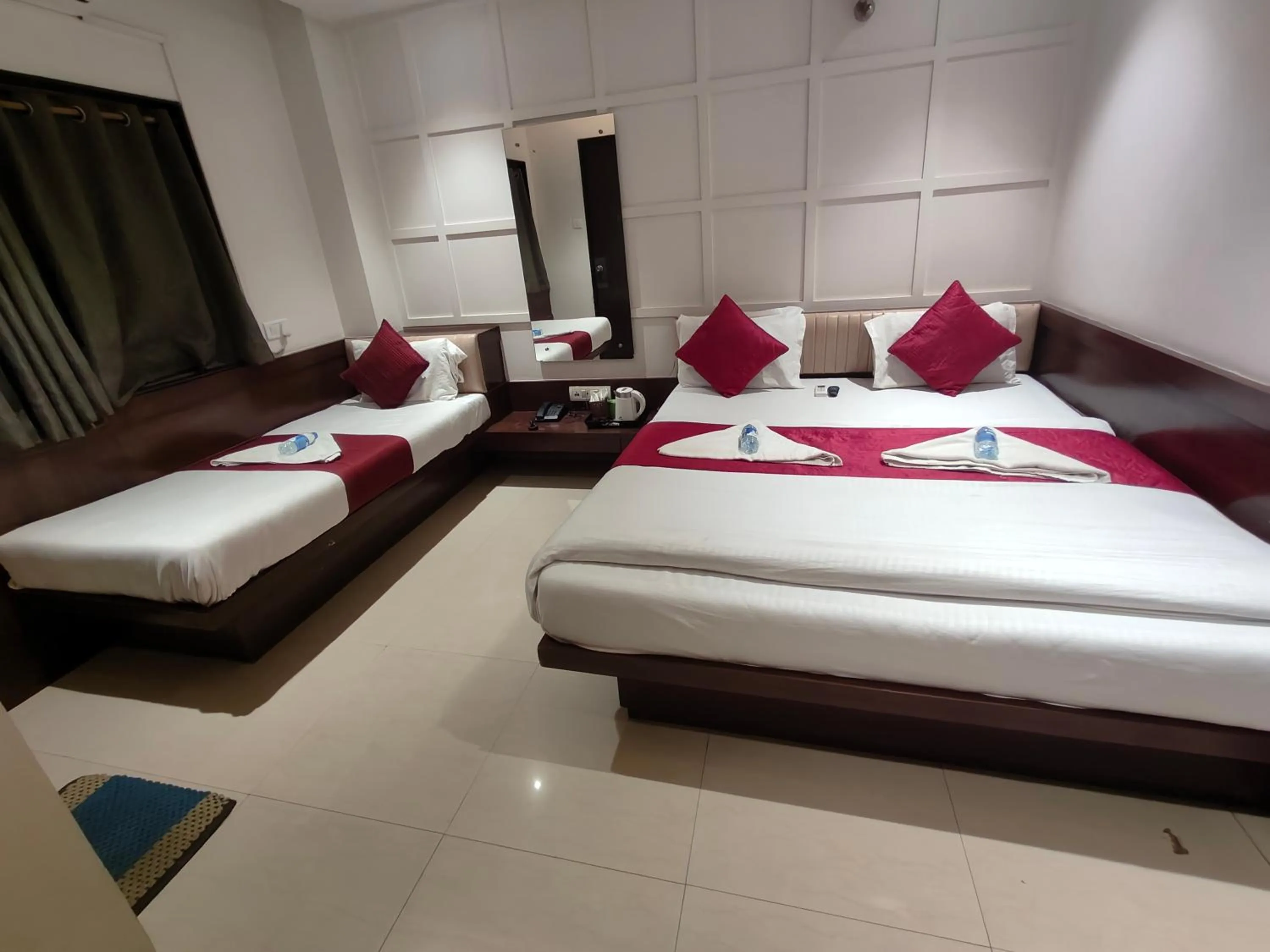 Bed in Hotel Anand Palace