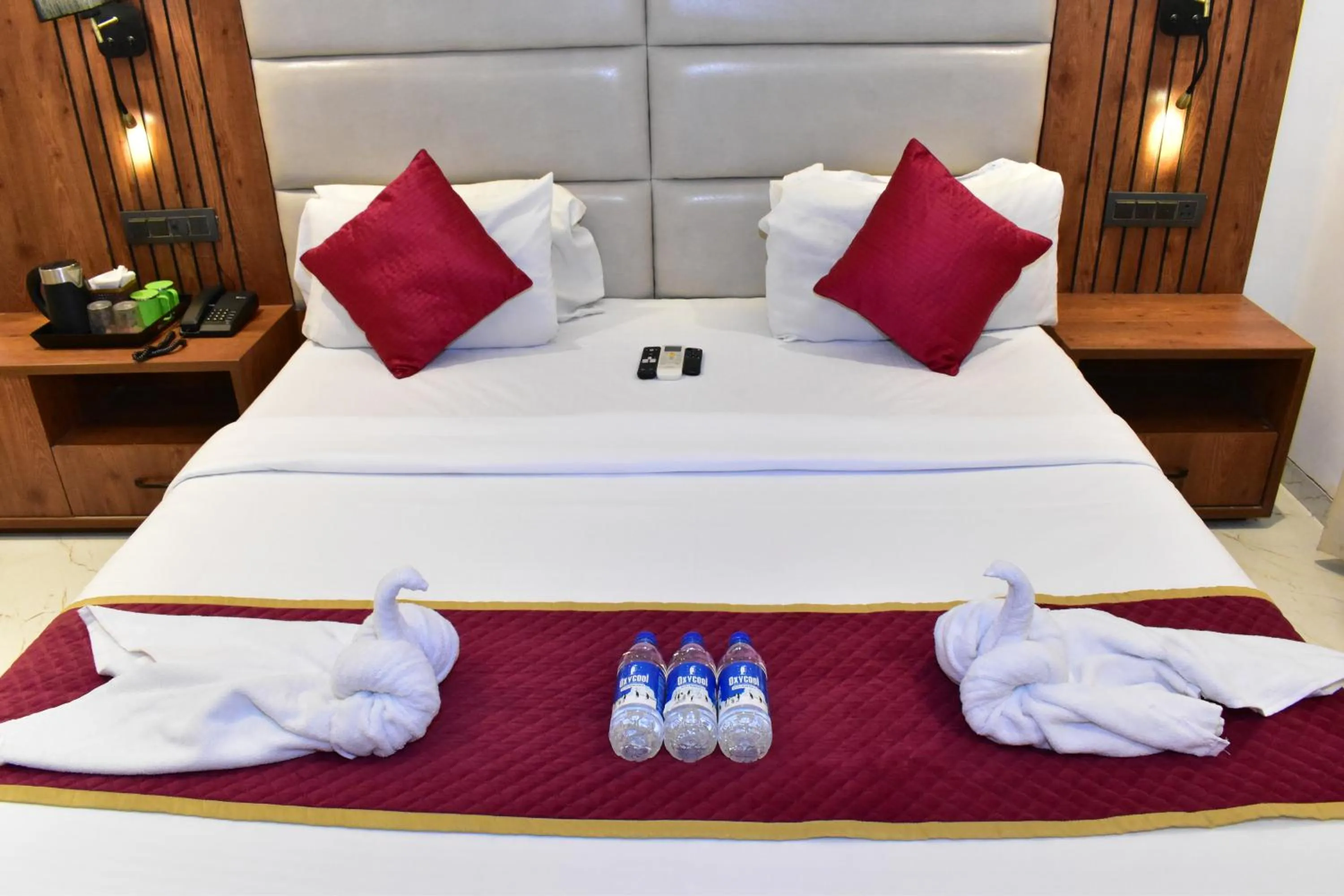 Bed in Hotel Anand Palace