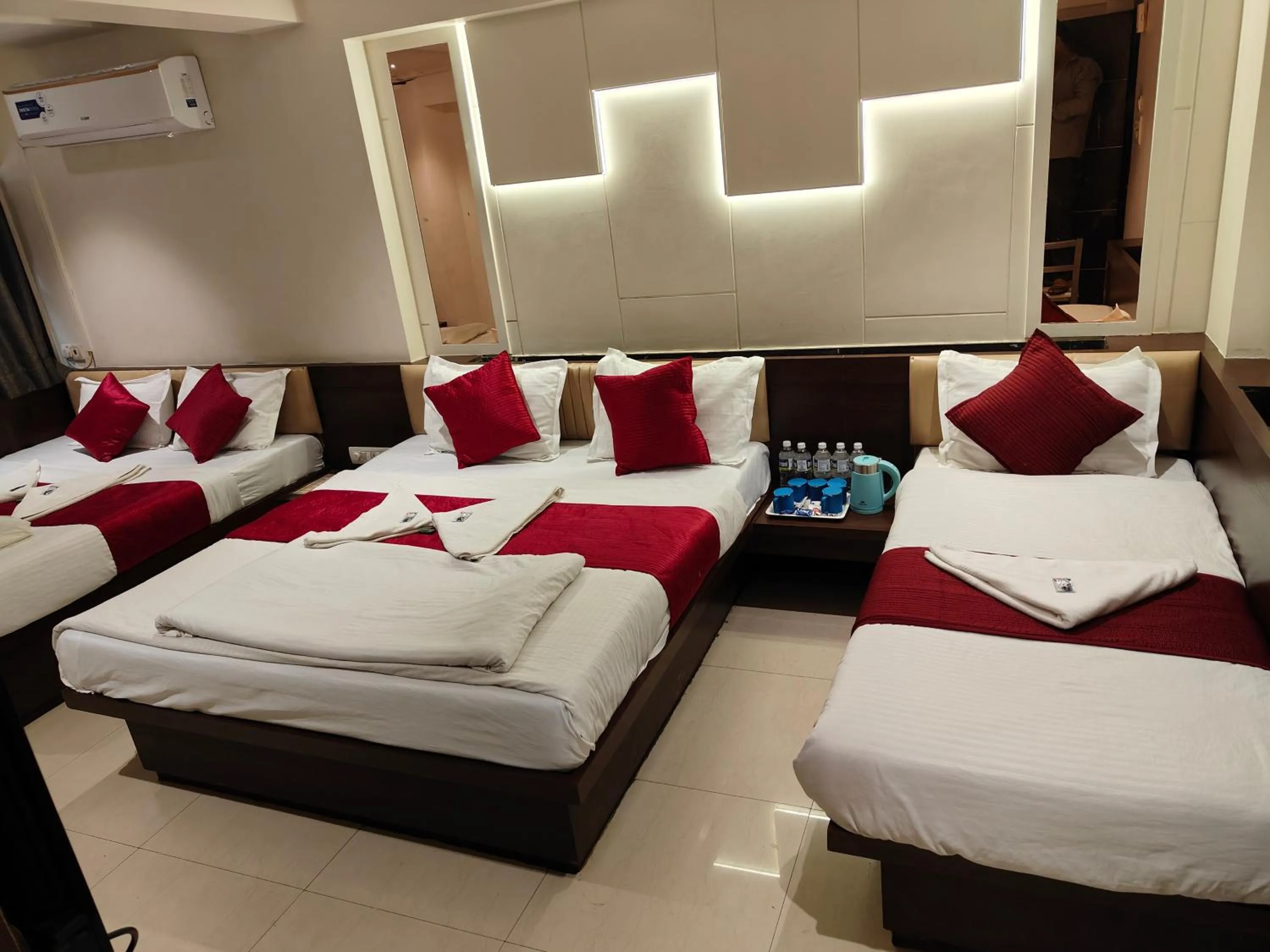 Bed in Hotel Anand Palace