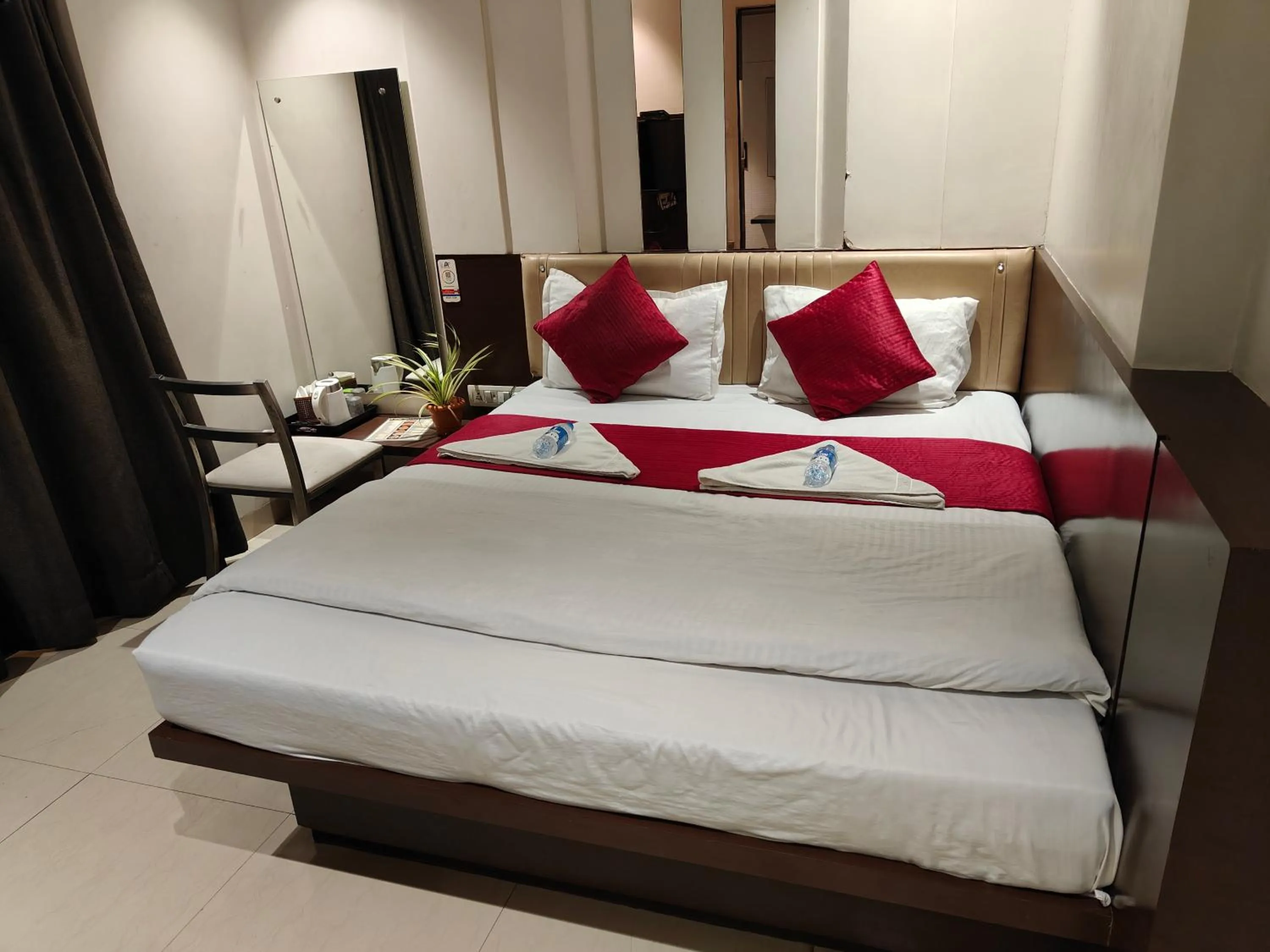Bed in Hotel Anand Palace