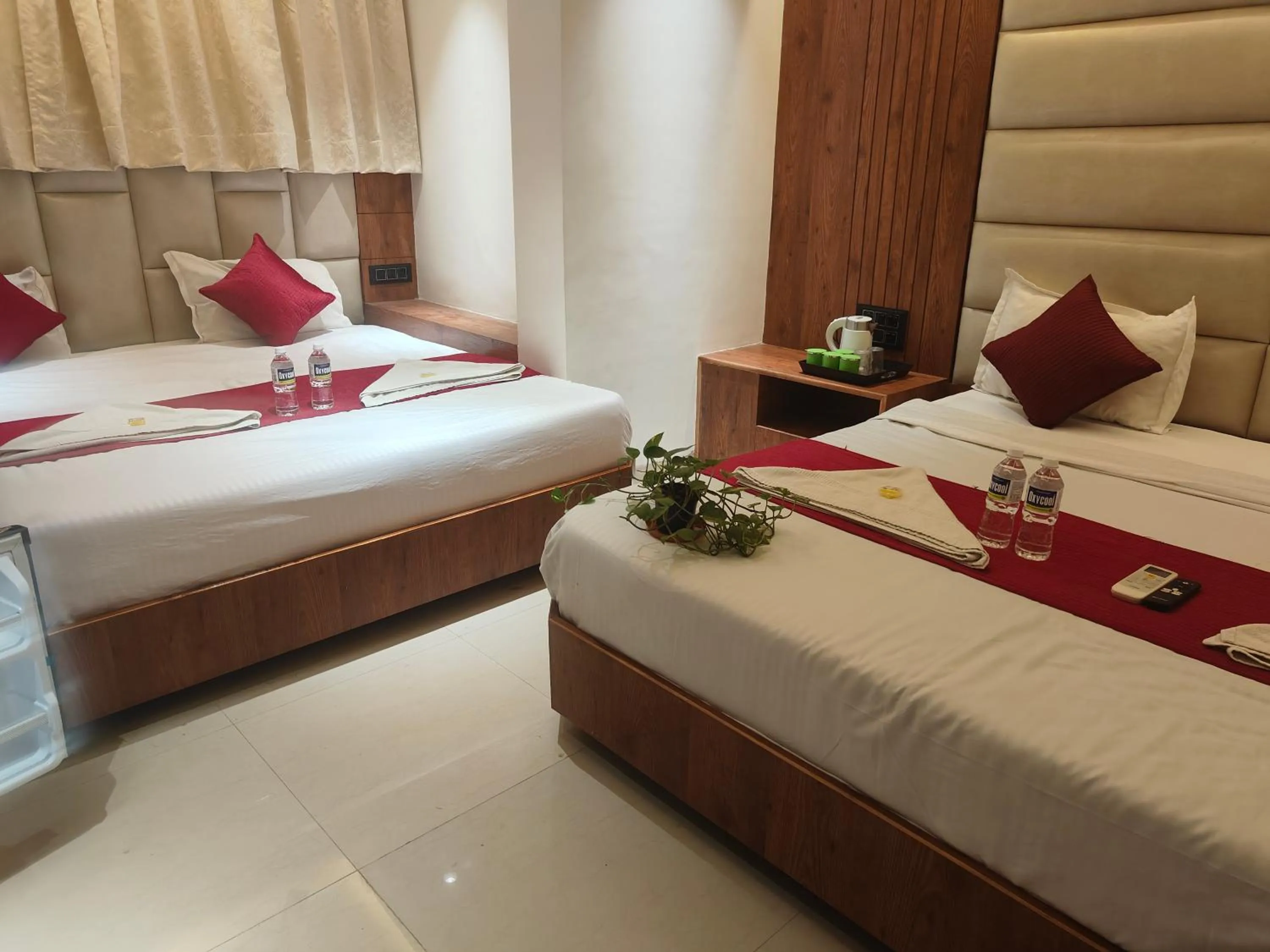 Bed in Hotel Anand Palace