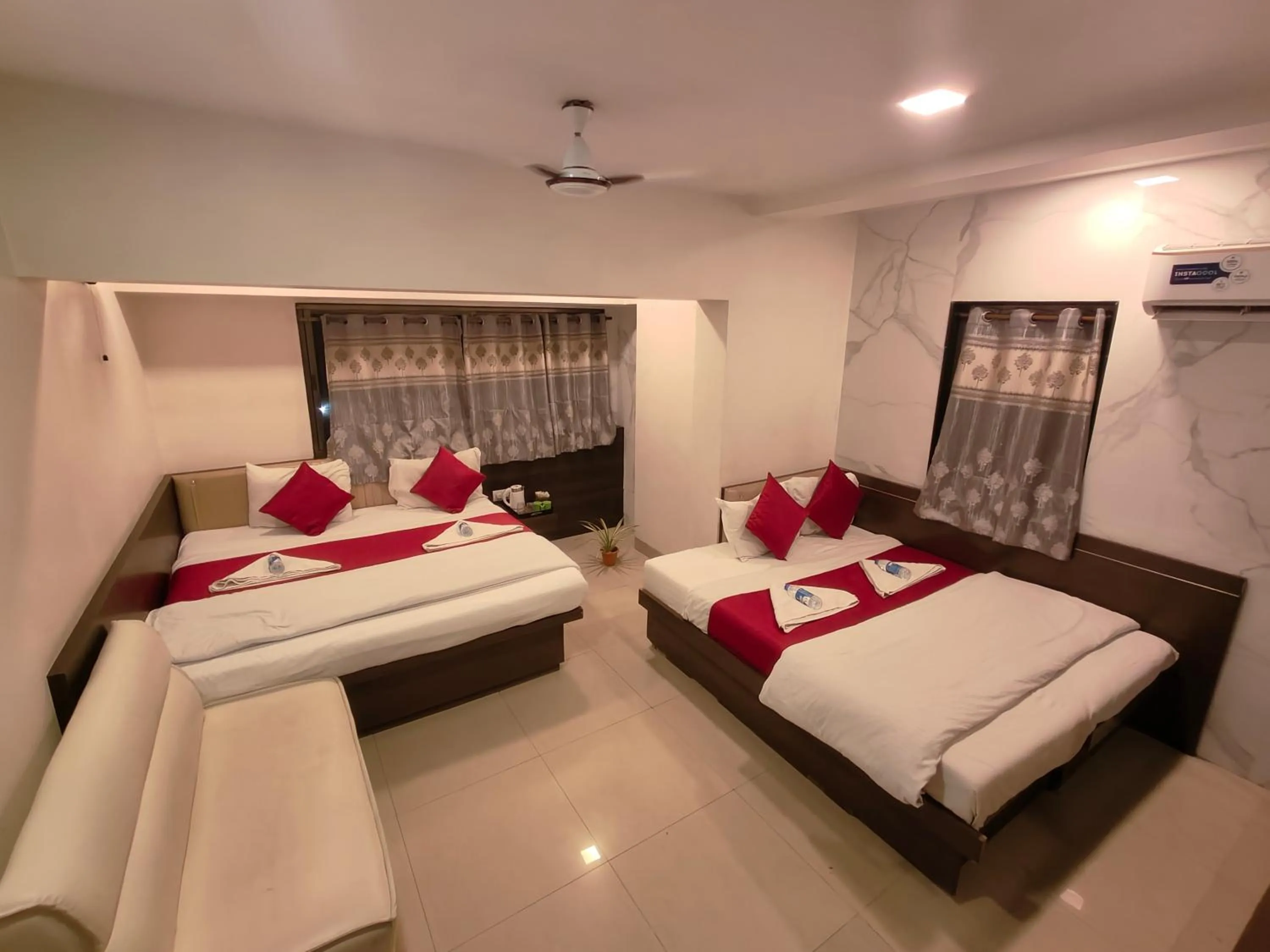 Bed in Hotel Anand Palace