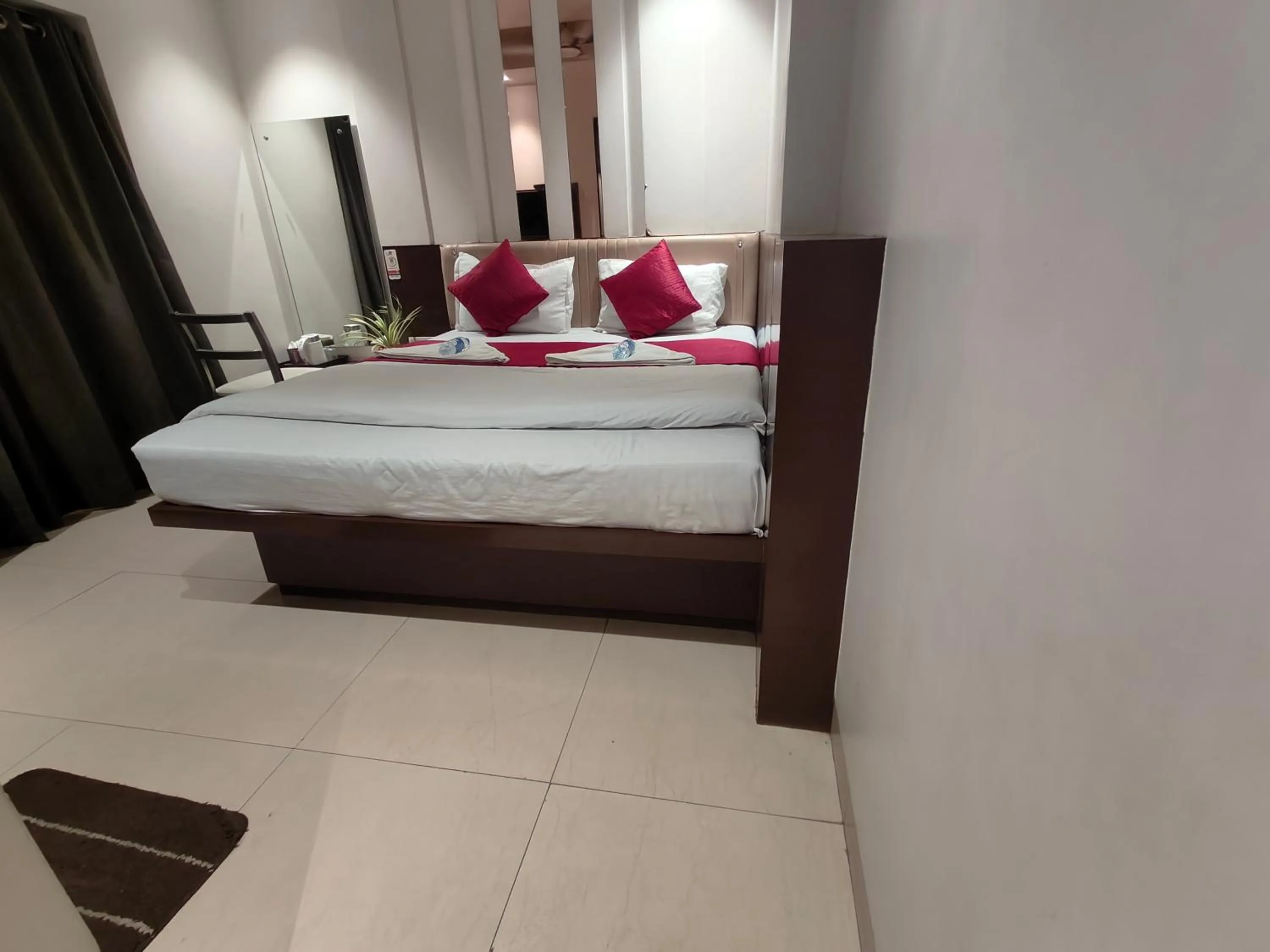 Bed in Hotel Anand Palace