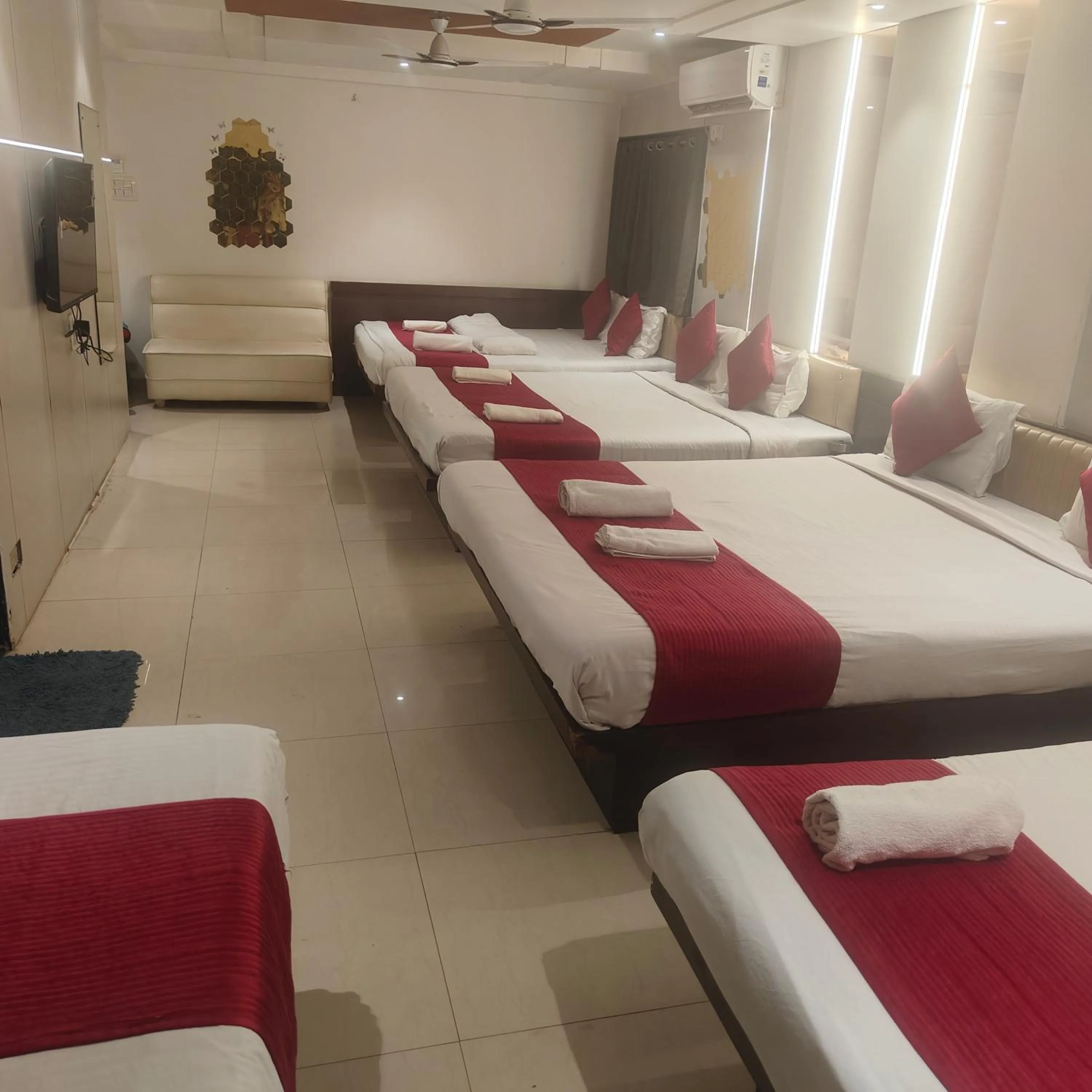 Bed in Hotel Anand Palace