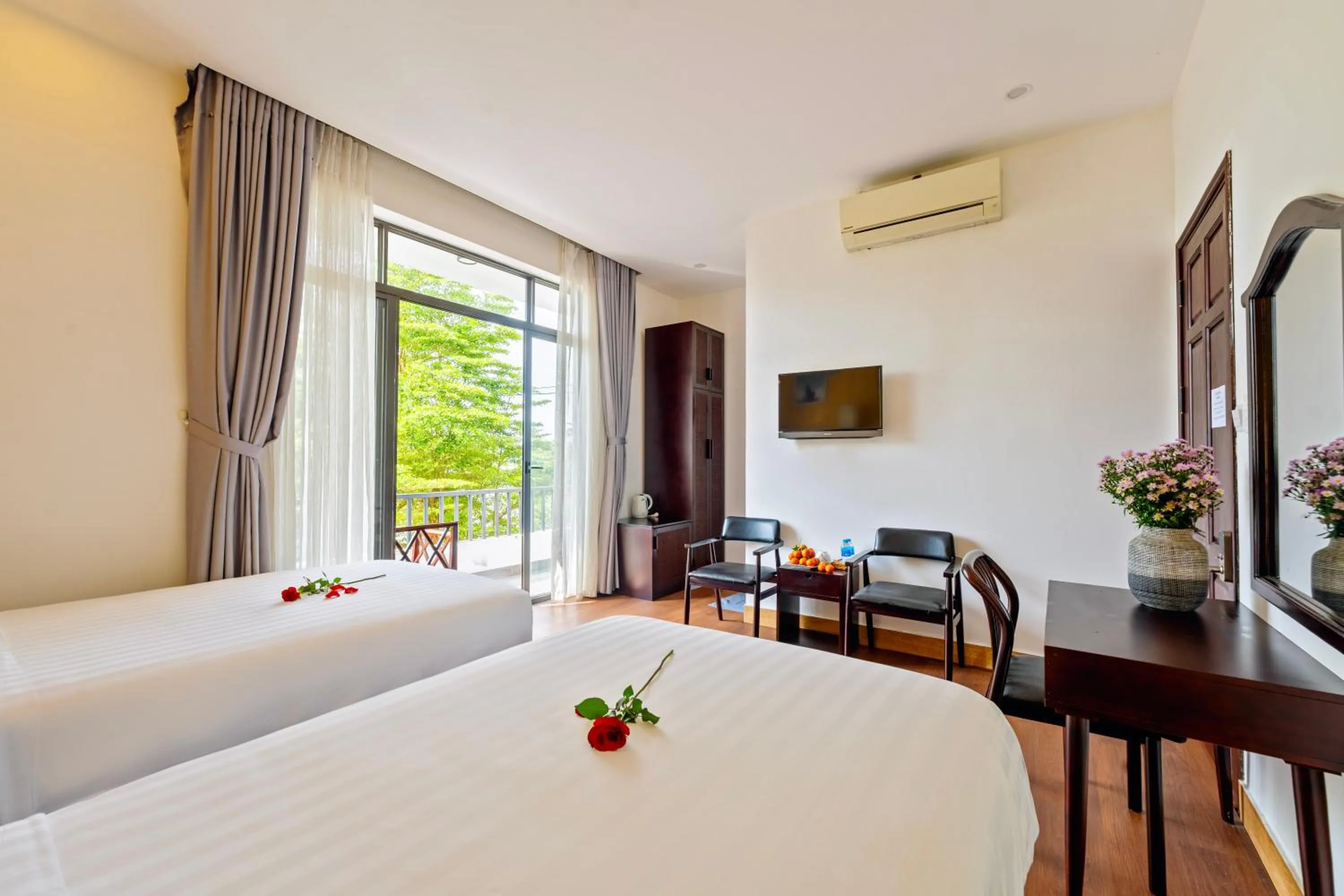 Bed in Serene Riverside Hotel Hoi An