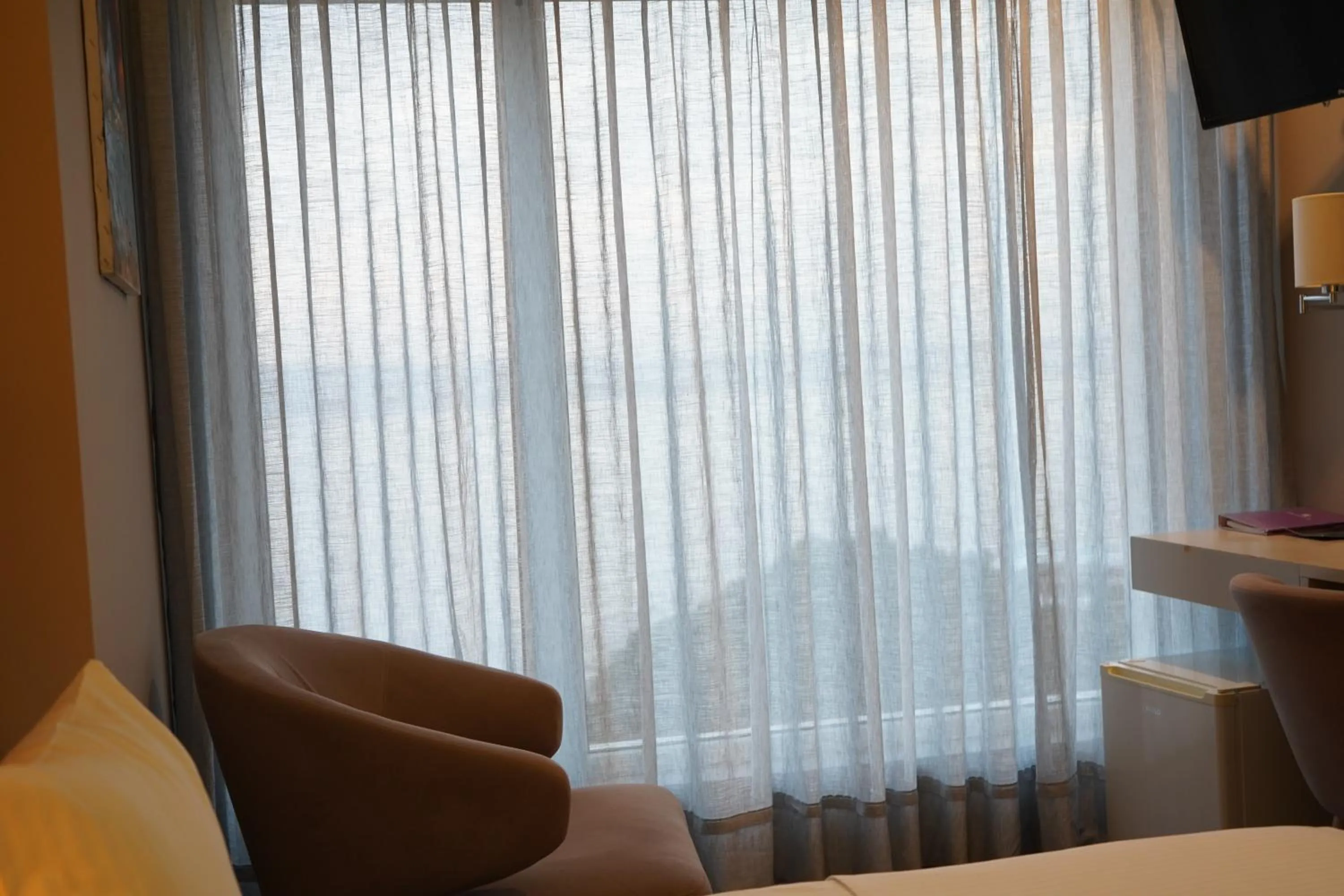 Bed in Bougainville Bay Hotel