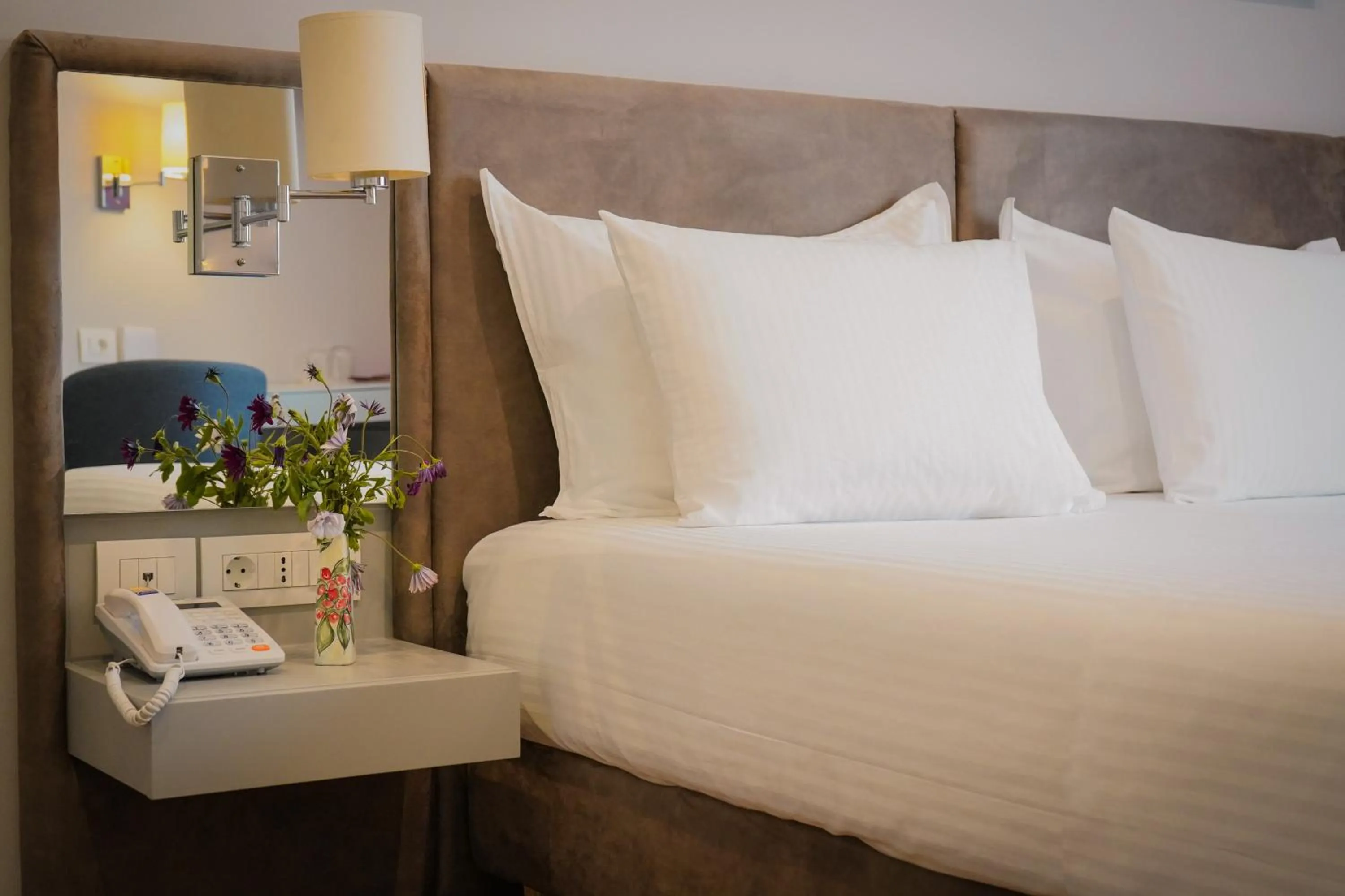 Bed in Bougainville Bay Hotel