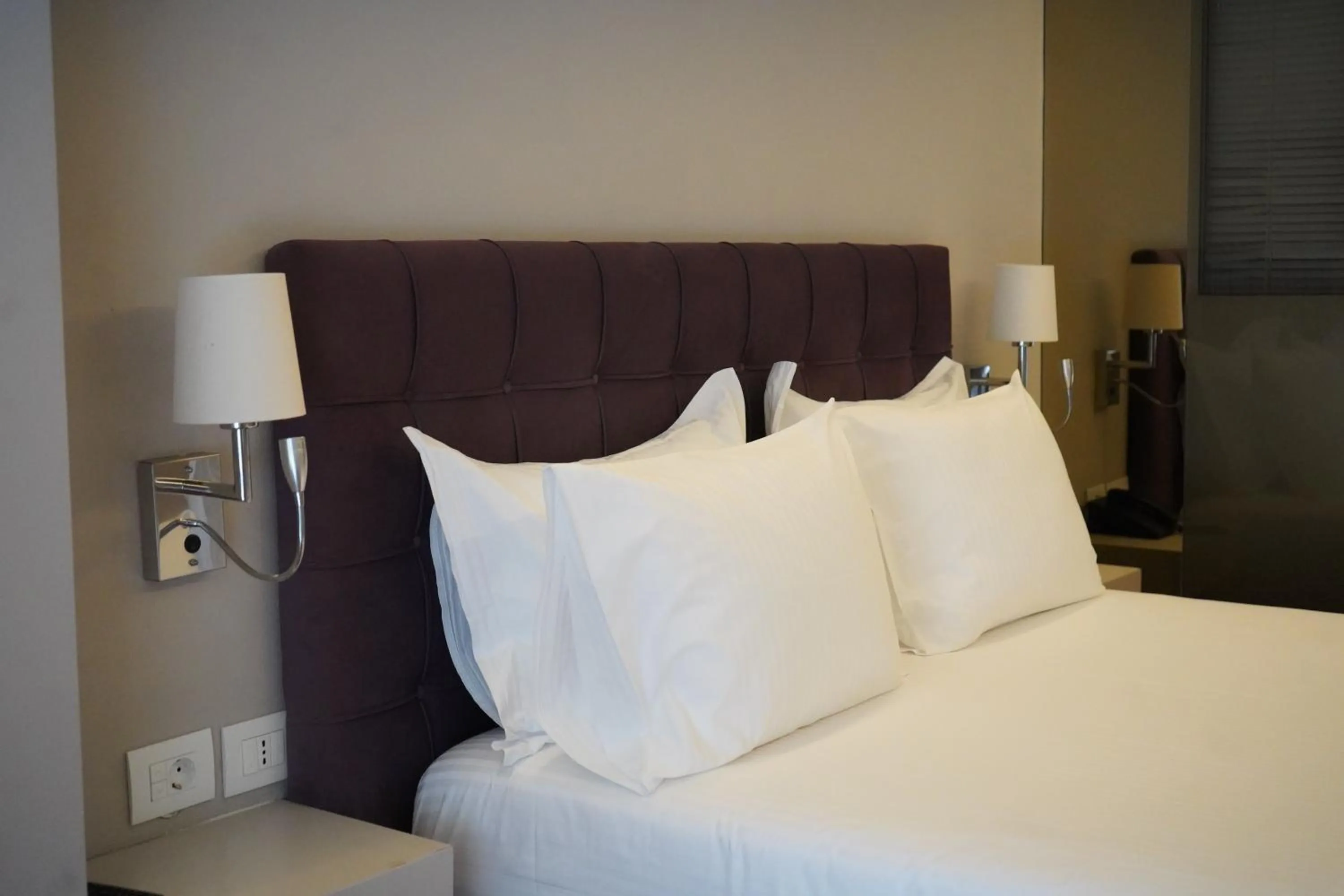 Bed in Bougainville Bay Hotel