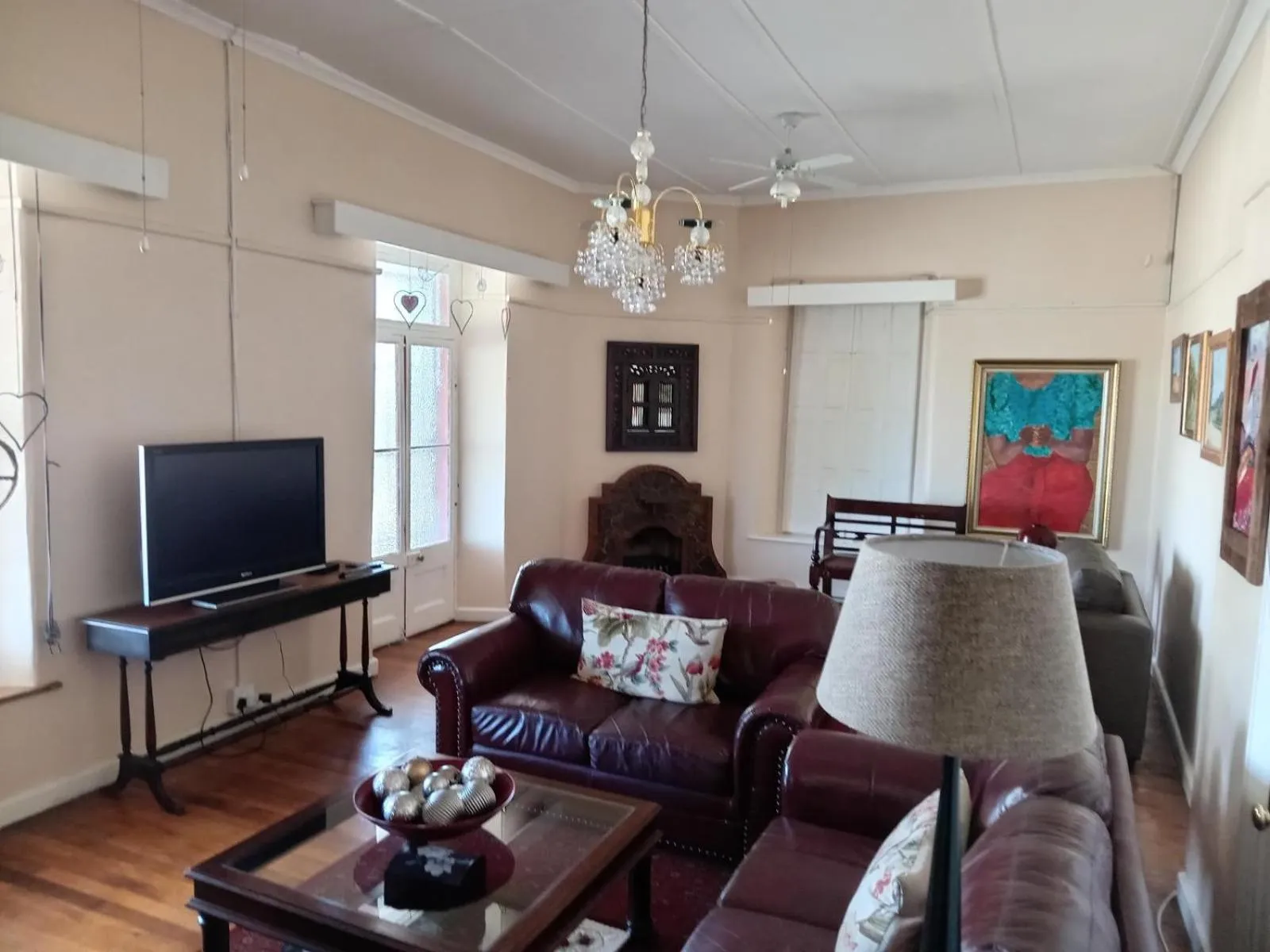 Communal lounge/ TV room in Stellar Dust Guesthouse Previously The Blue Moon Guesthouse