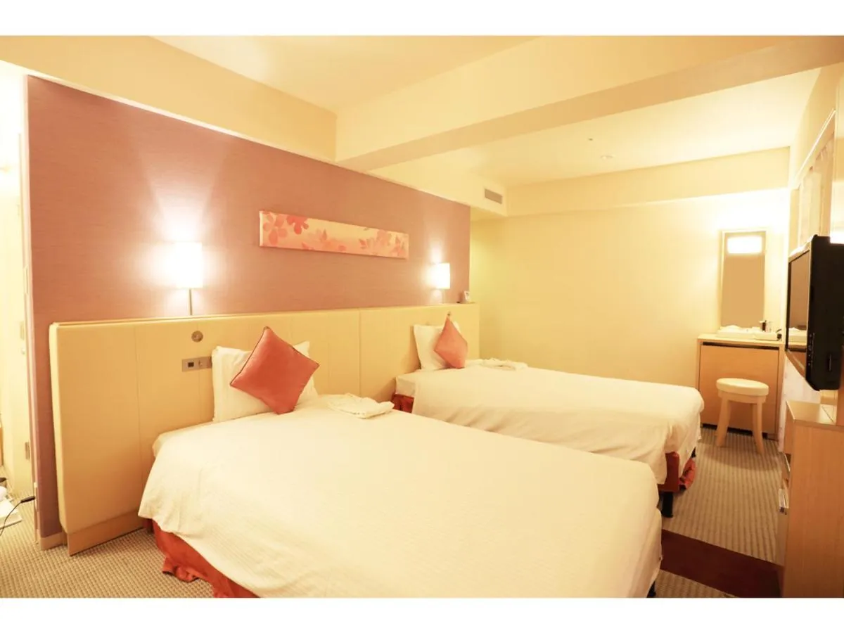 Photo of the whole room, Bed in Smile Hotel Naha City Resort
