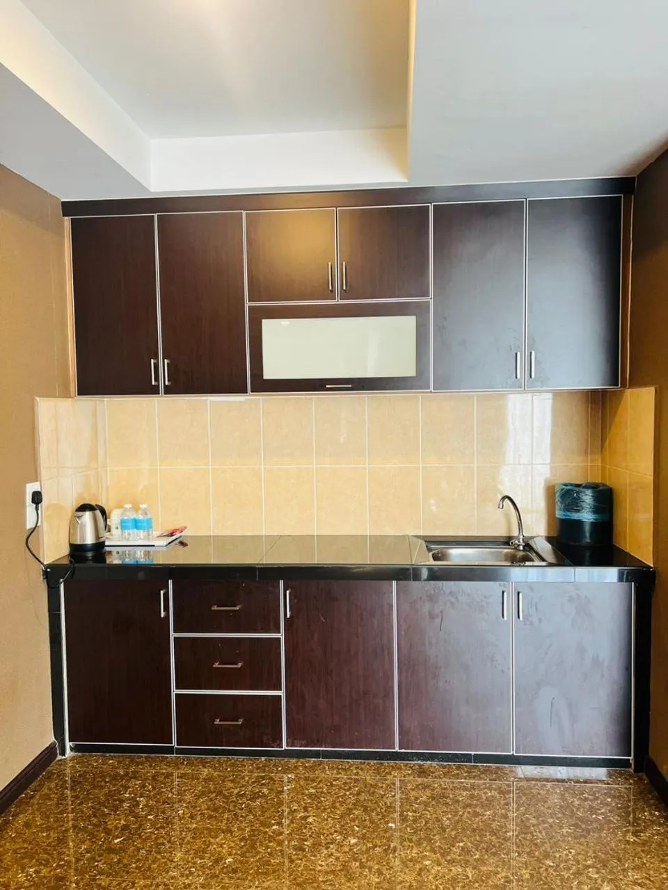 Kitchen or kitchenette in K Garden Hotel Sungai Petani