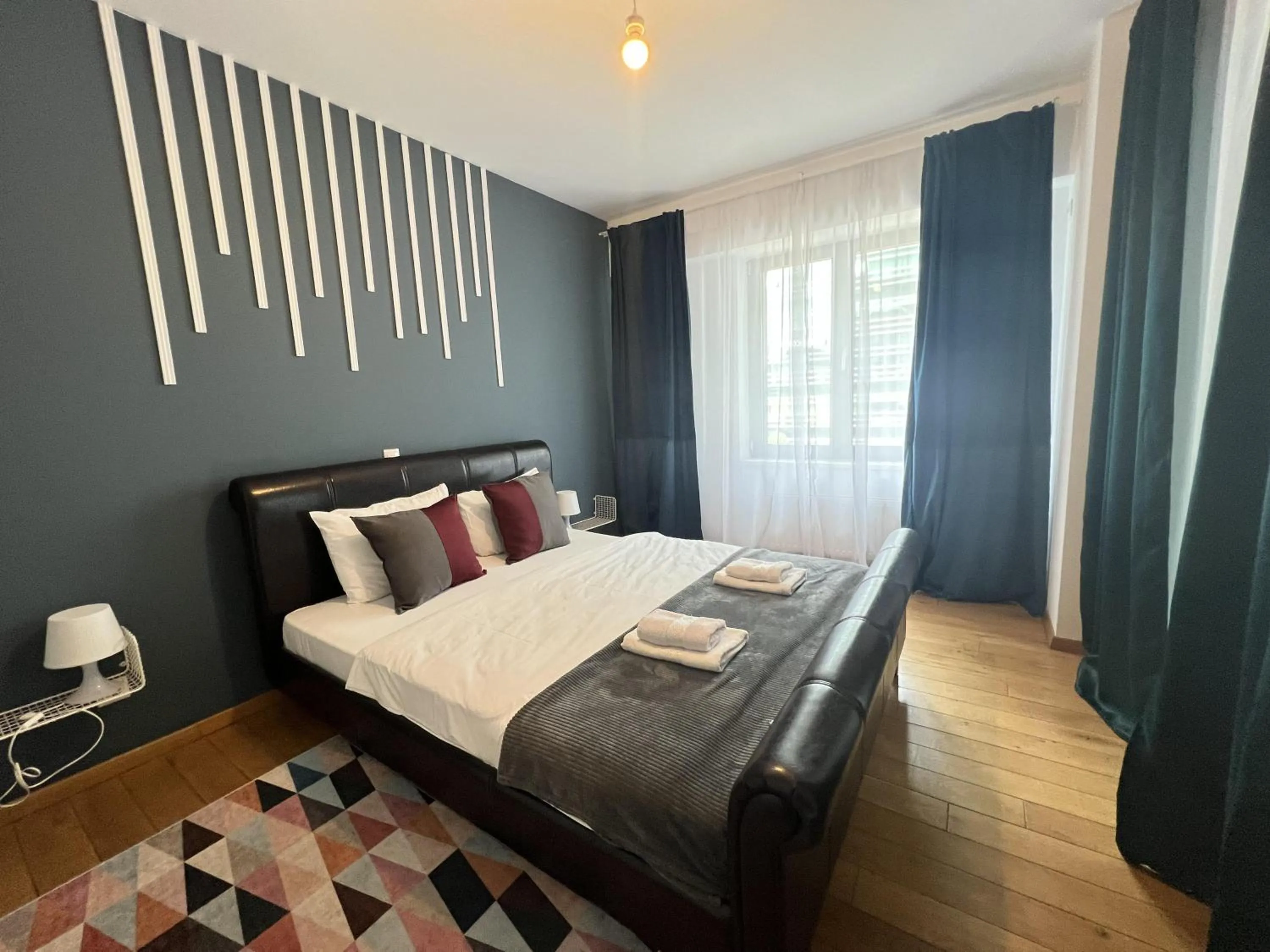 Bed in Upground Residence Apartments