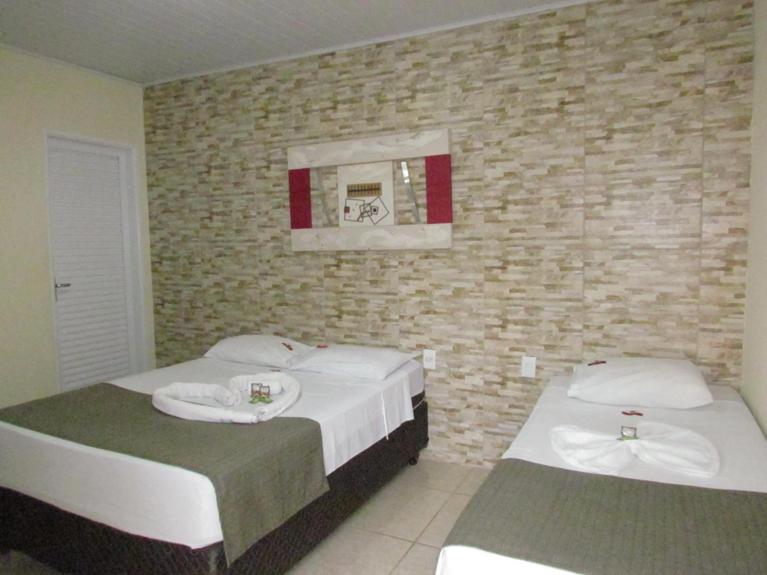 Bed in Pousada Quinta Das Aroeiras