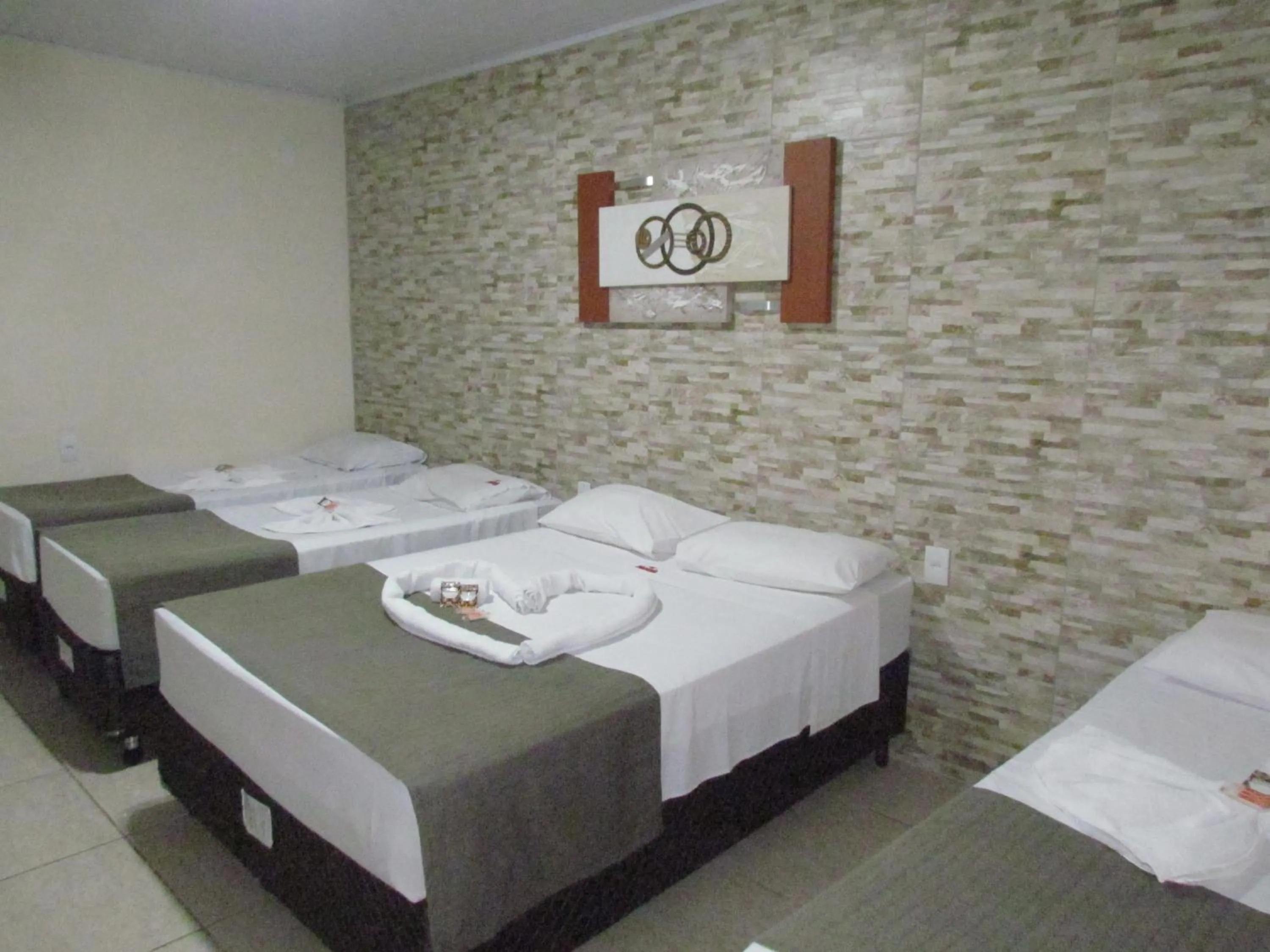 Bed in Pousada Quinta Das Aroeiras