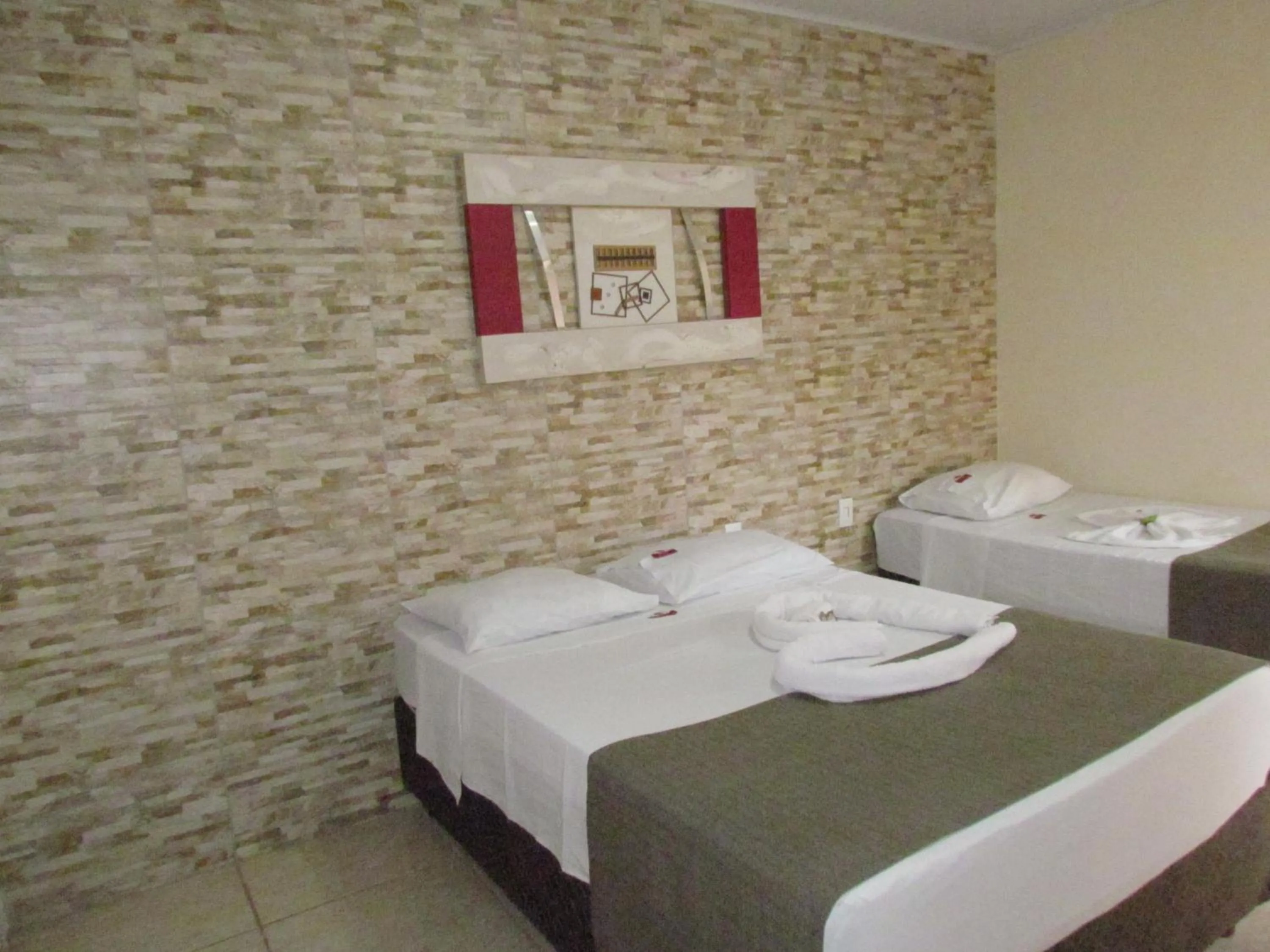 Bed in Pousada Quinta Das Aroeiras