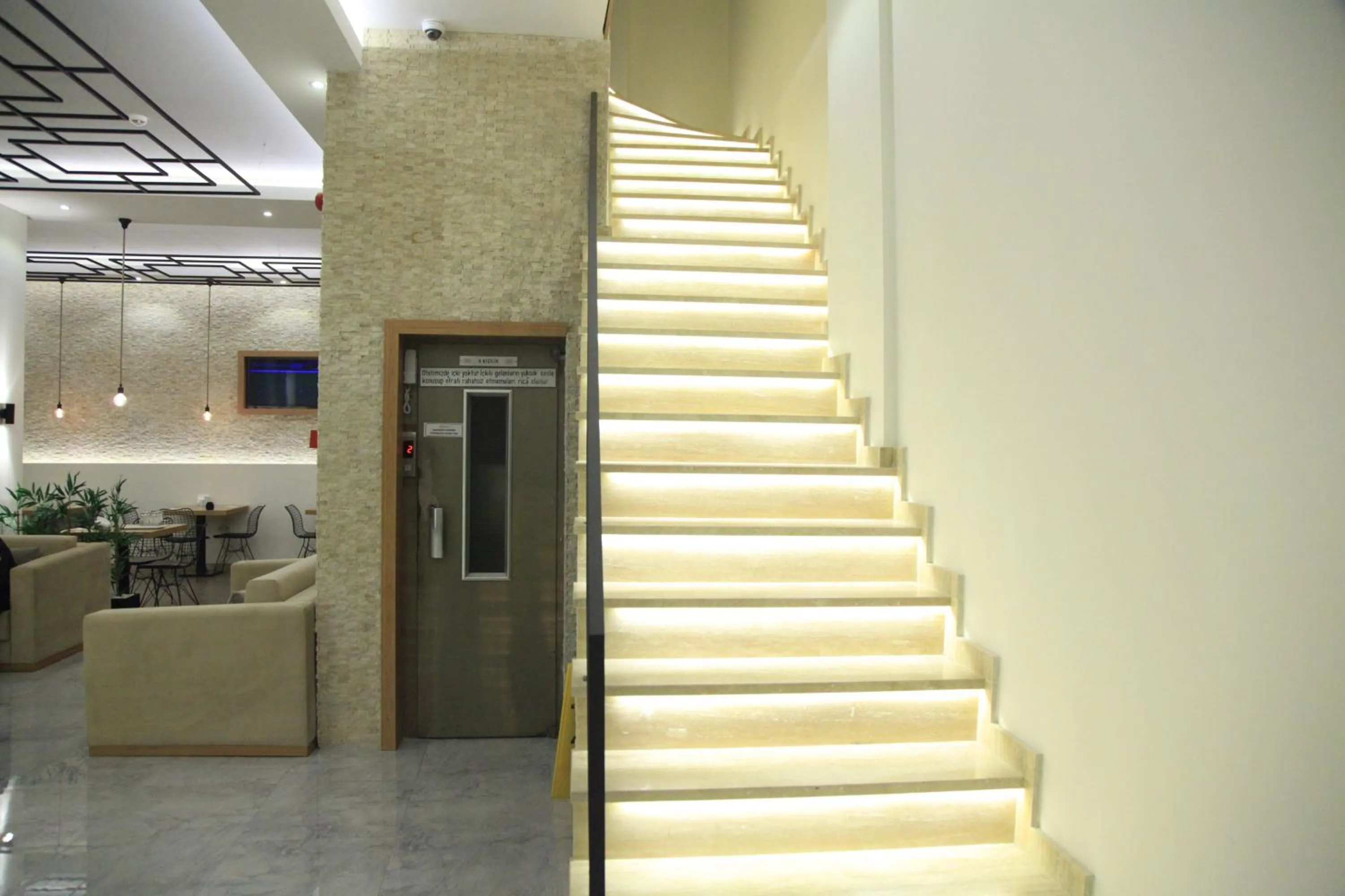 Communal lounge/ TV room in Okur Otel