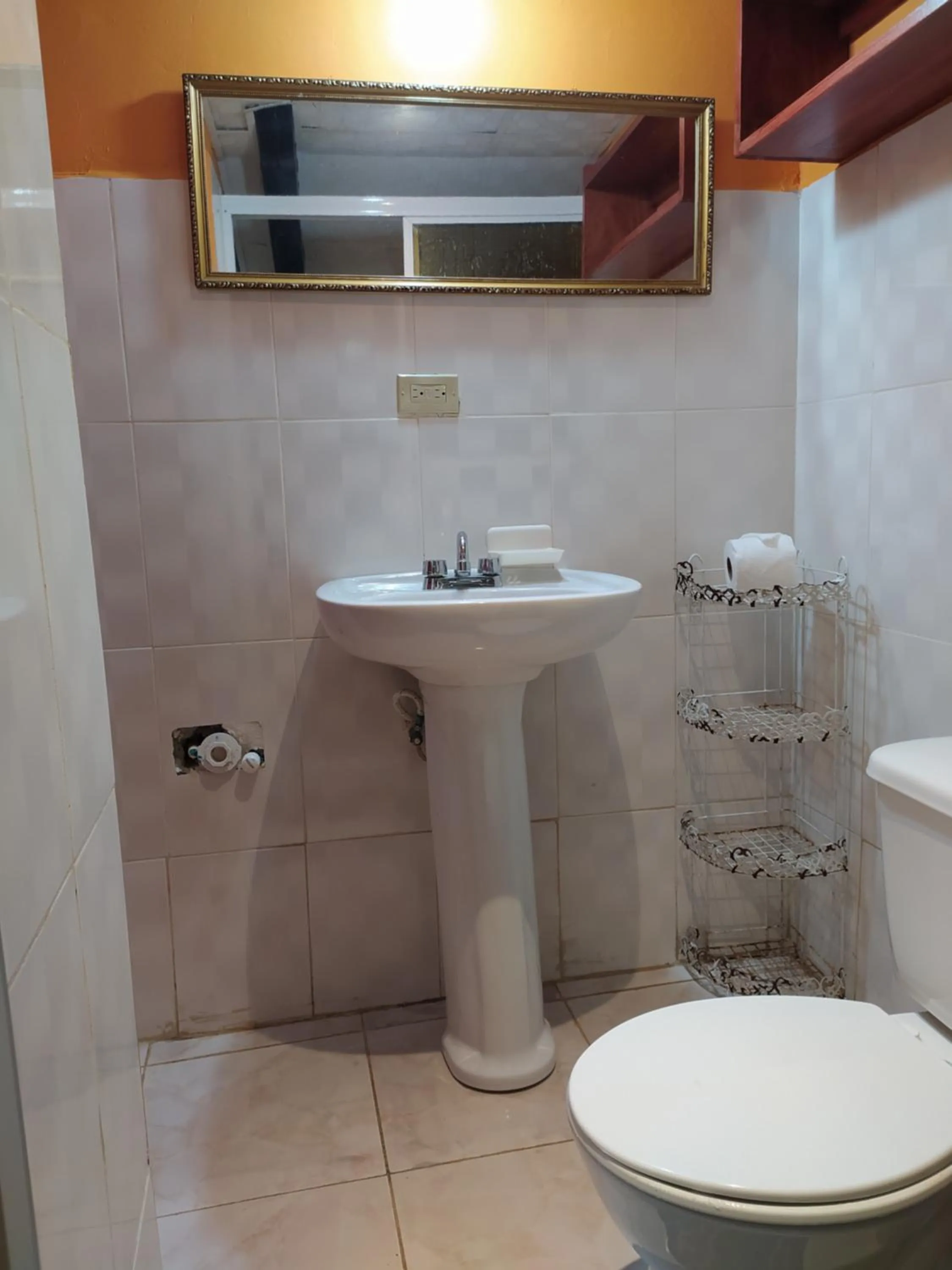 Bathroom in Sun Havens Apartments & Suites