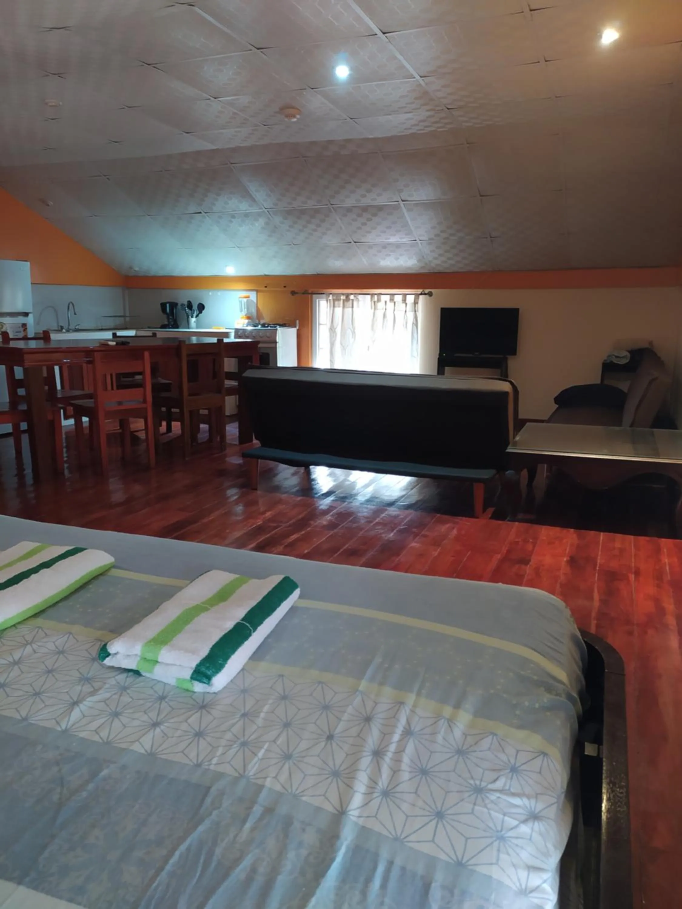 Bed in Sun Havens Apartments & Suites