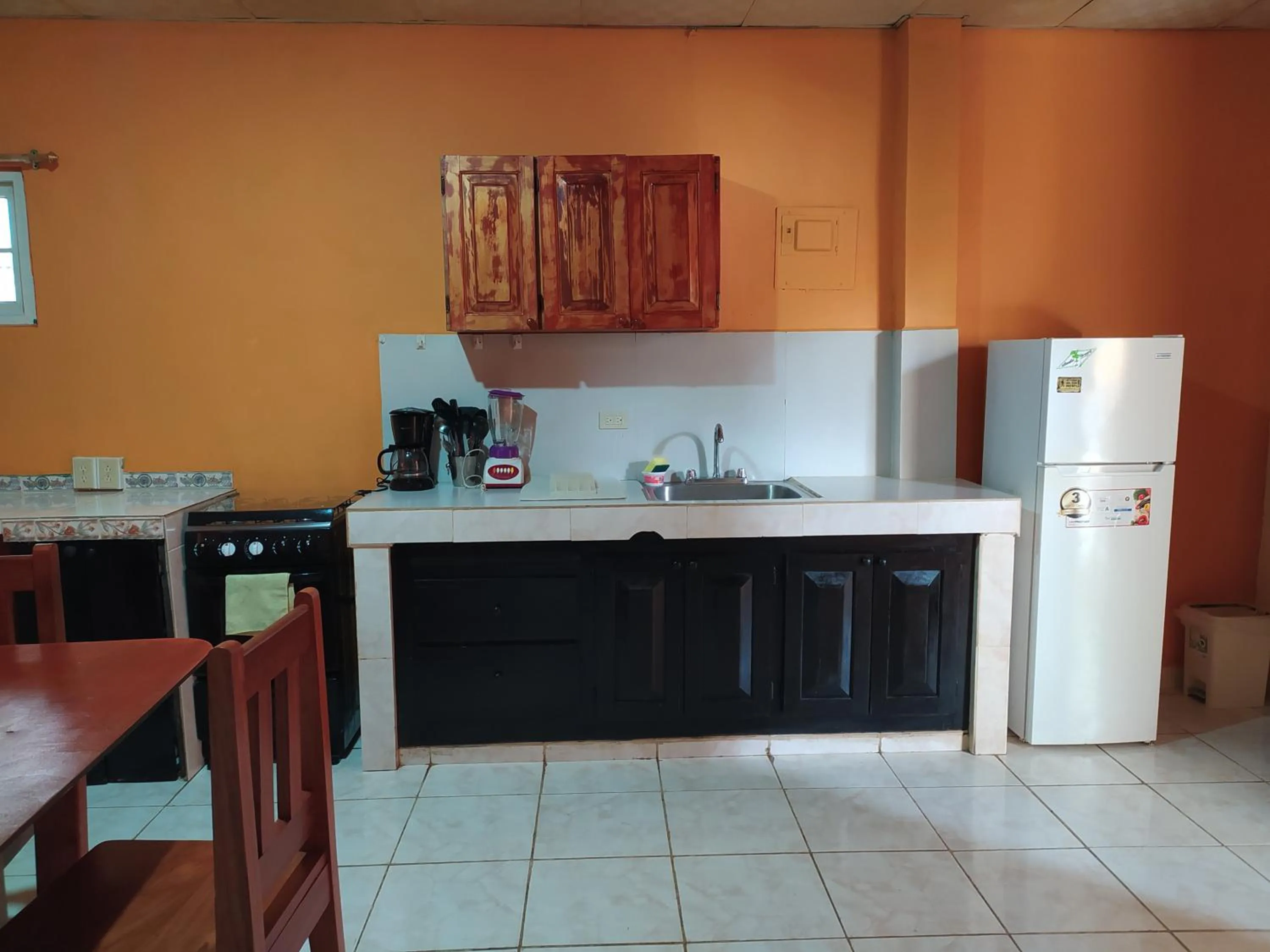 kitchen in Sun Havens Apartments & Suites