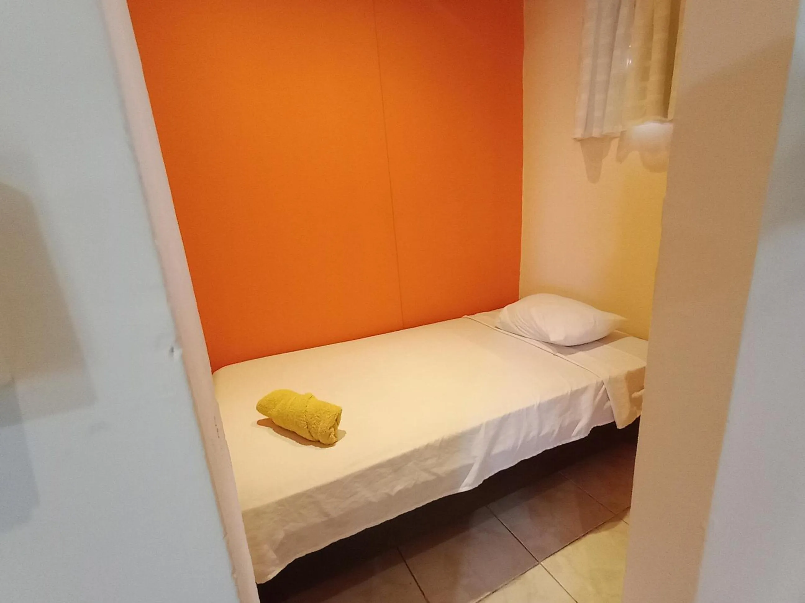 Bed in Sun Havens Apartments & Suites