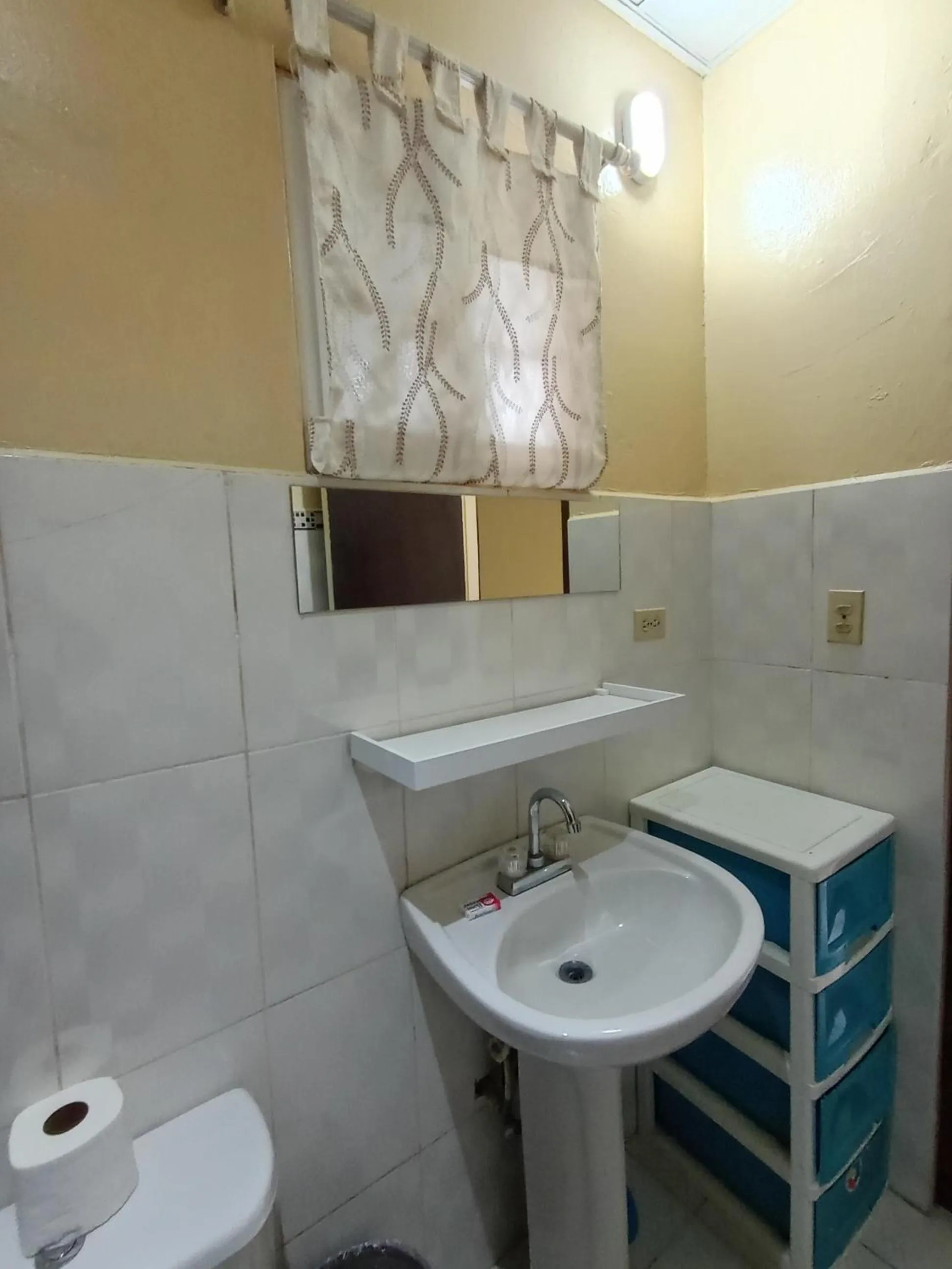 Bathroom in Sun Havens Apartments & Suites