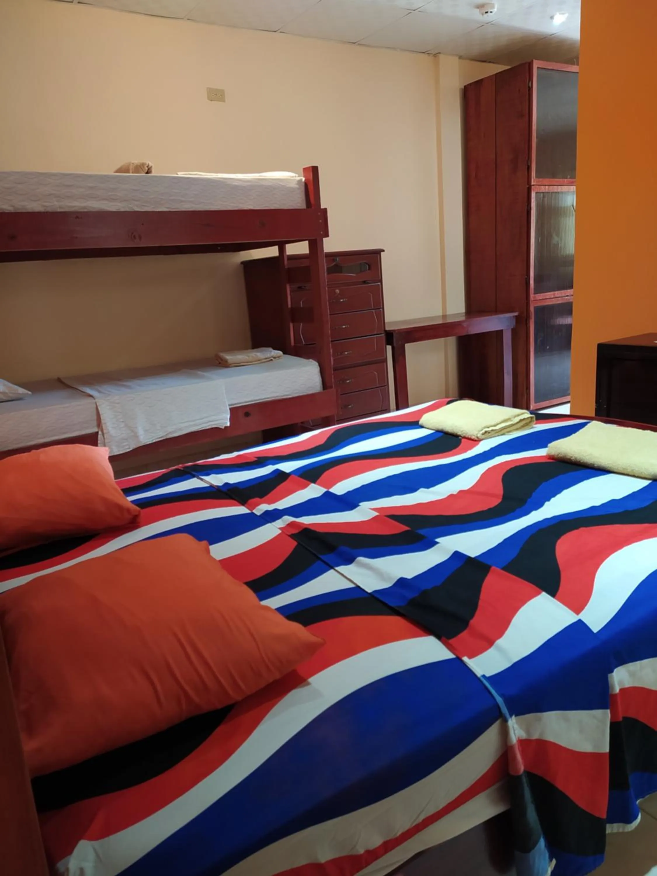 Bed in Sun Havens Apartments & Suites