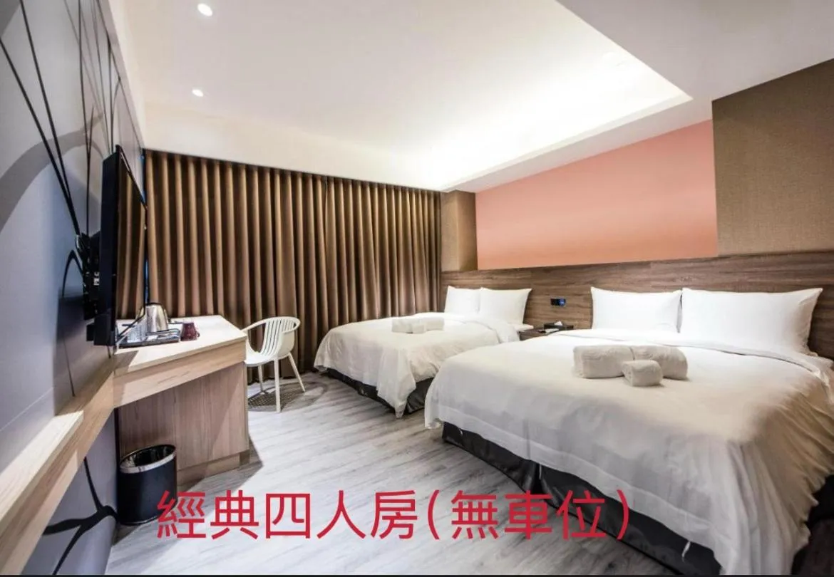 Bed in SIX FUKUN HOTEL