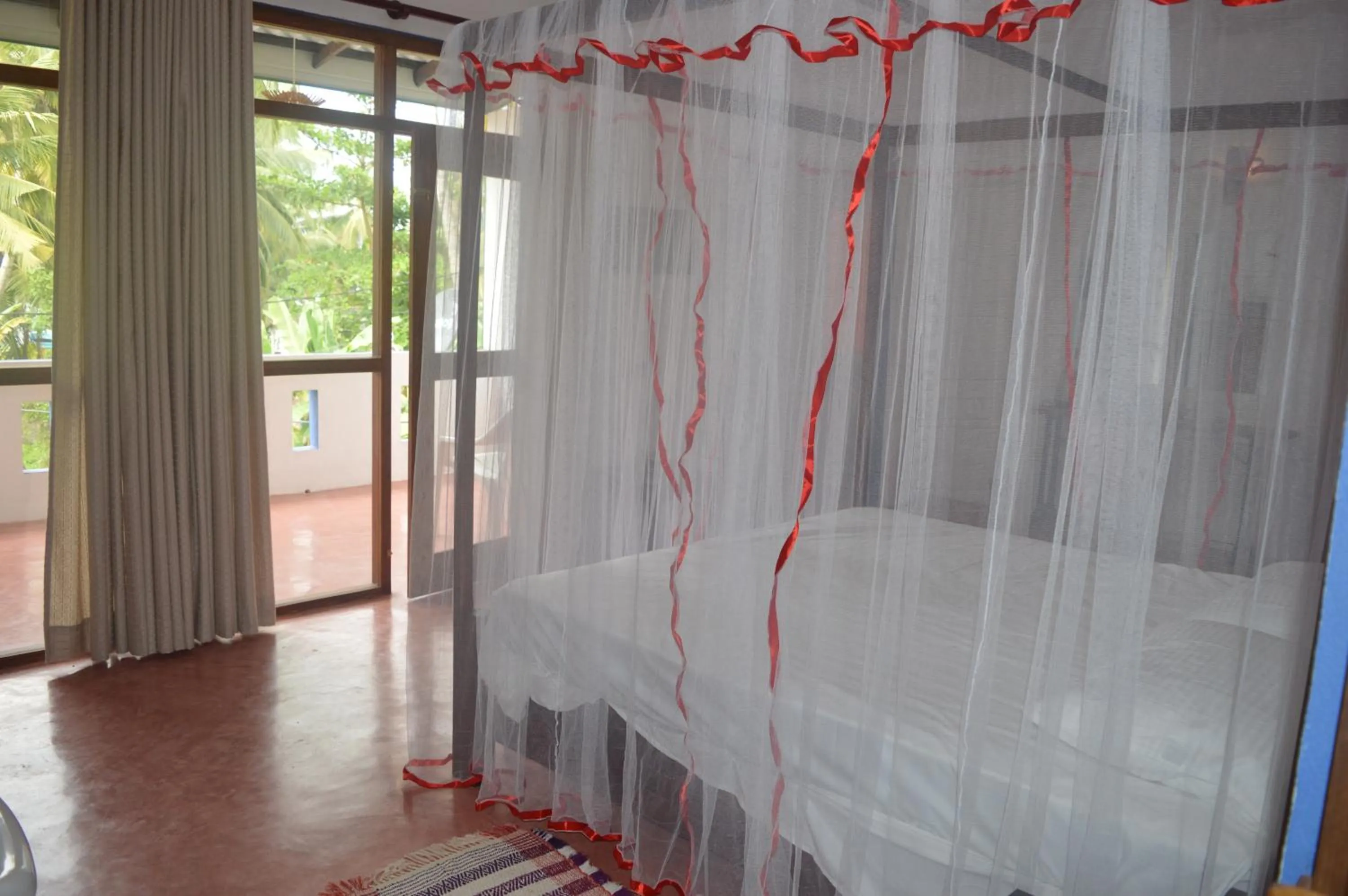 Bed in FEEL Beach Villa