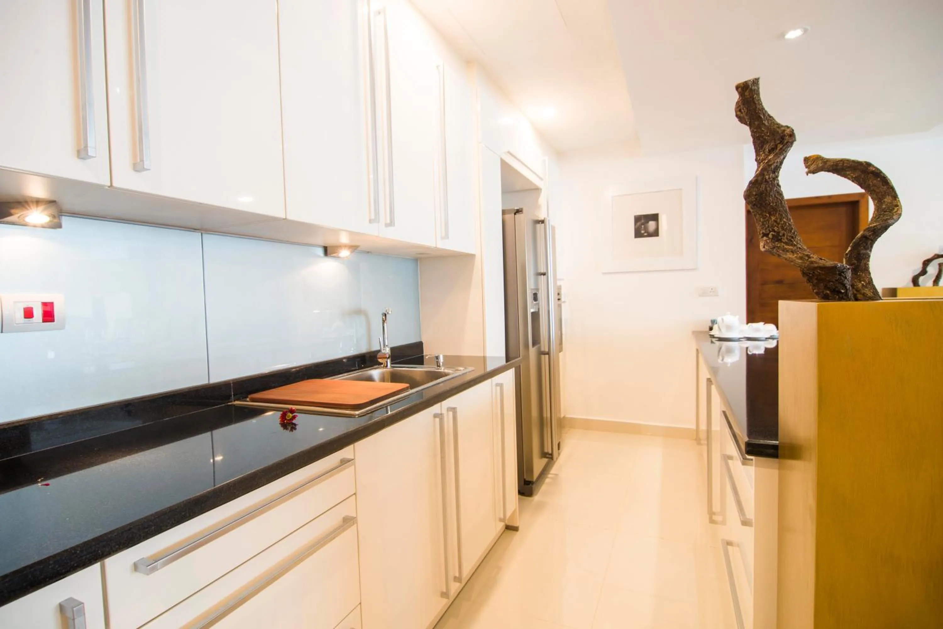 Kitchen or kitchenette in Platinum One Suites