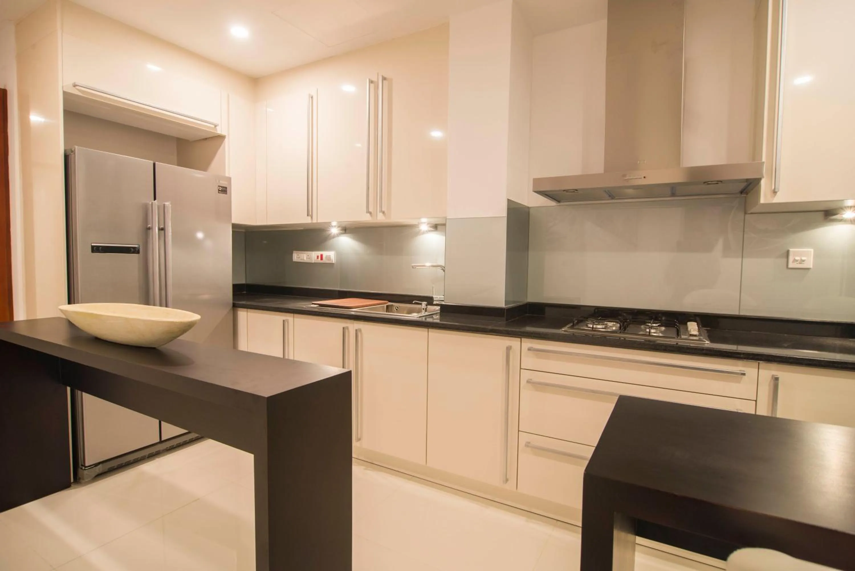 Kitchen or kitchenette in Platinum One Suites